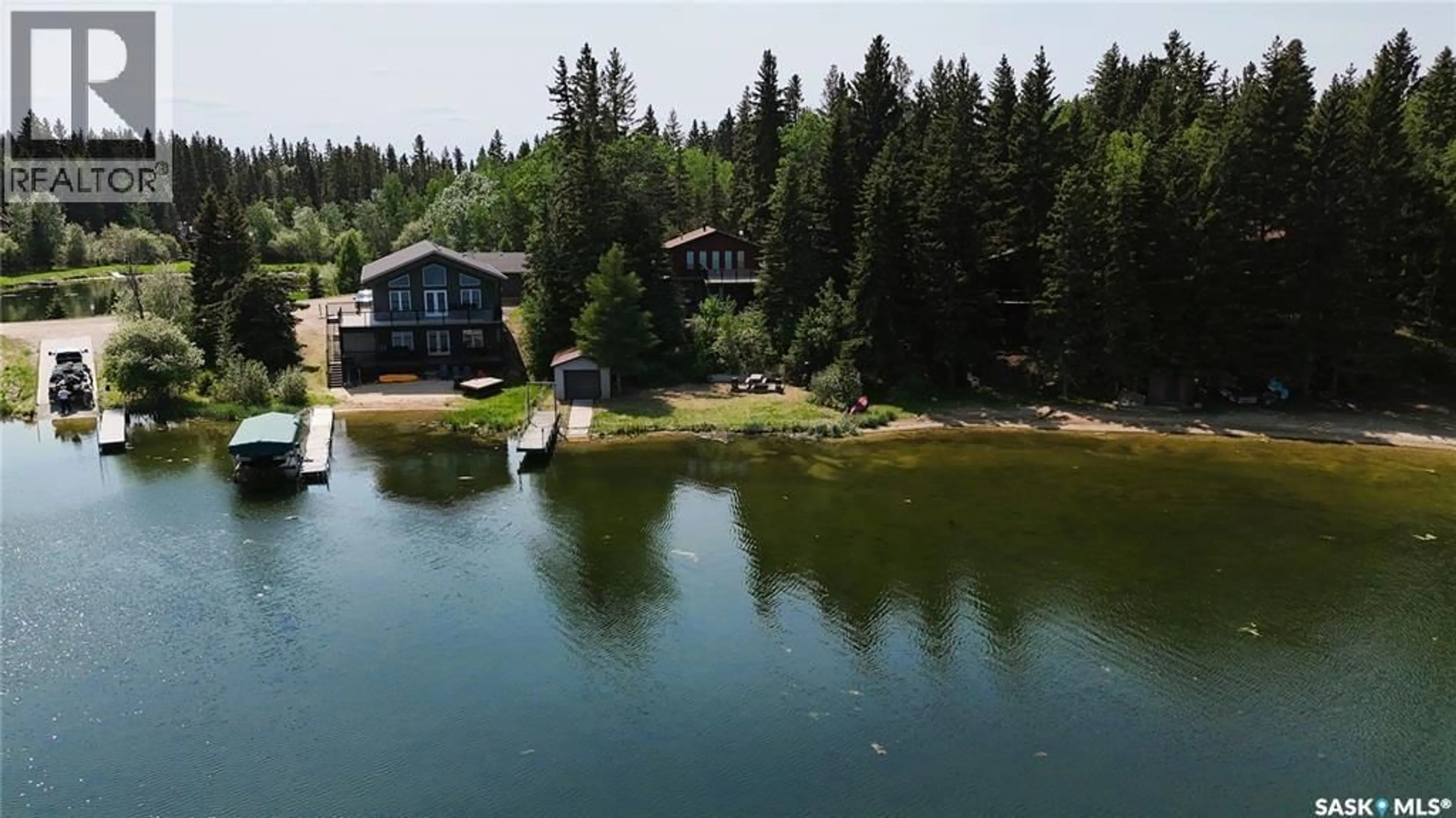 A pic from outside/outdoor area/front of a property/back of a property/a pic from drone, water/lake/river/ocean view for 102 LAKESHORE DRIVE, Echo Bay Saskatchewan S0J2G0