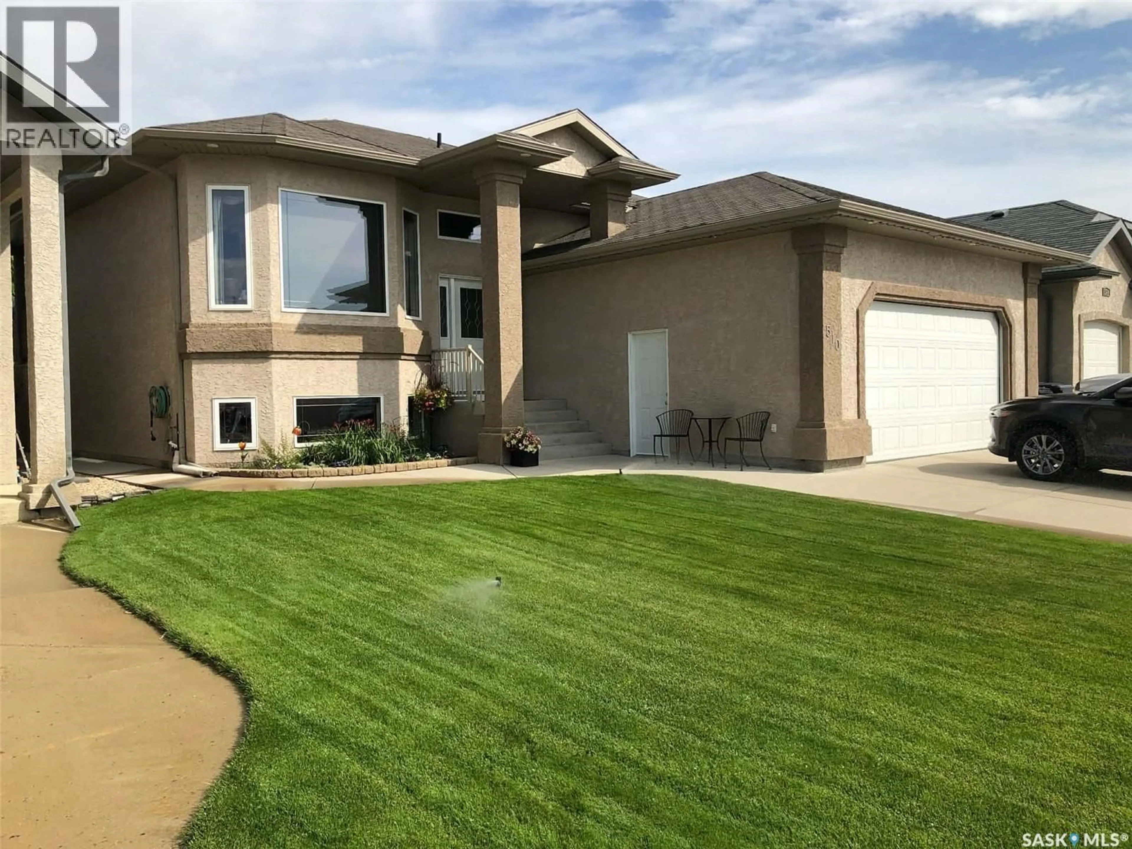 Home with vinyl exterior material, street for 510 GREAVES LANE, Saskatoon Saskatchewan S7W1B1