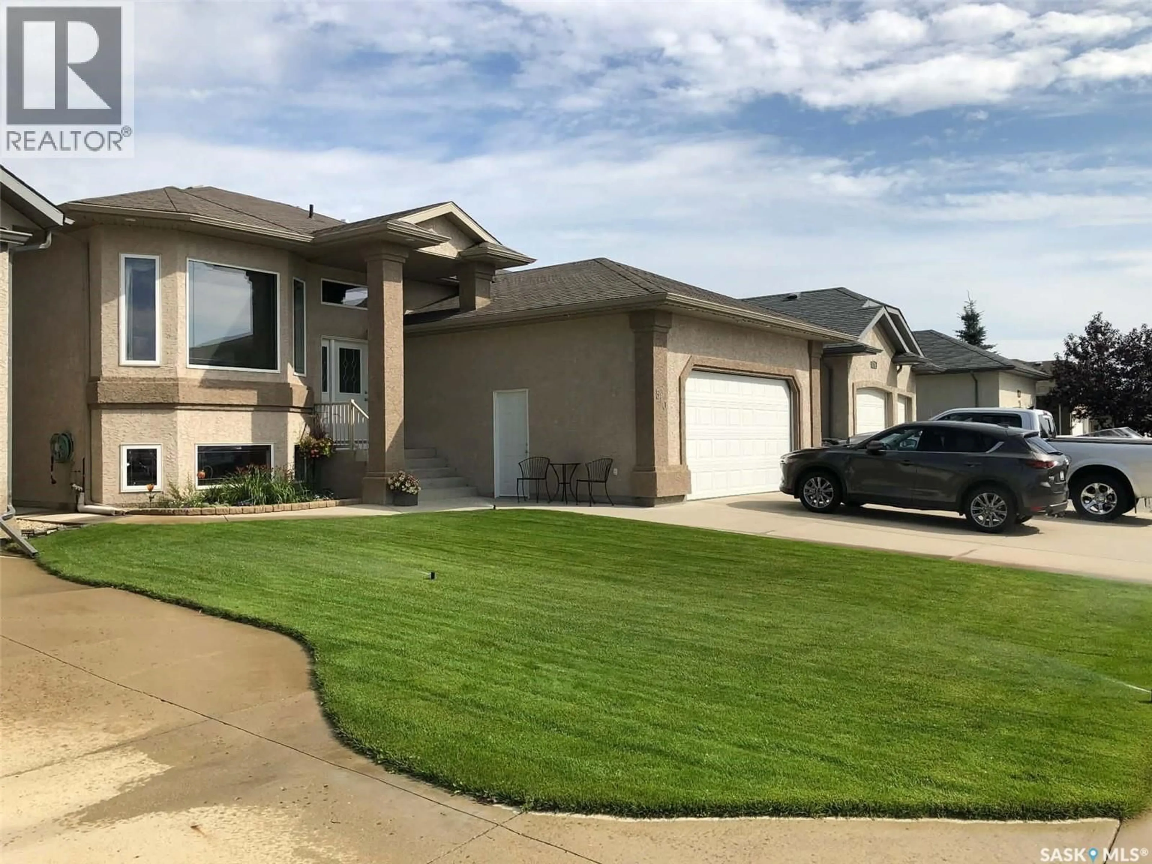 Home with vinyl exterior material, street for 510 GREAVES LANE, Saskatoon Saskatchewan S7W1B1