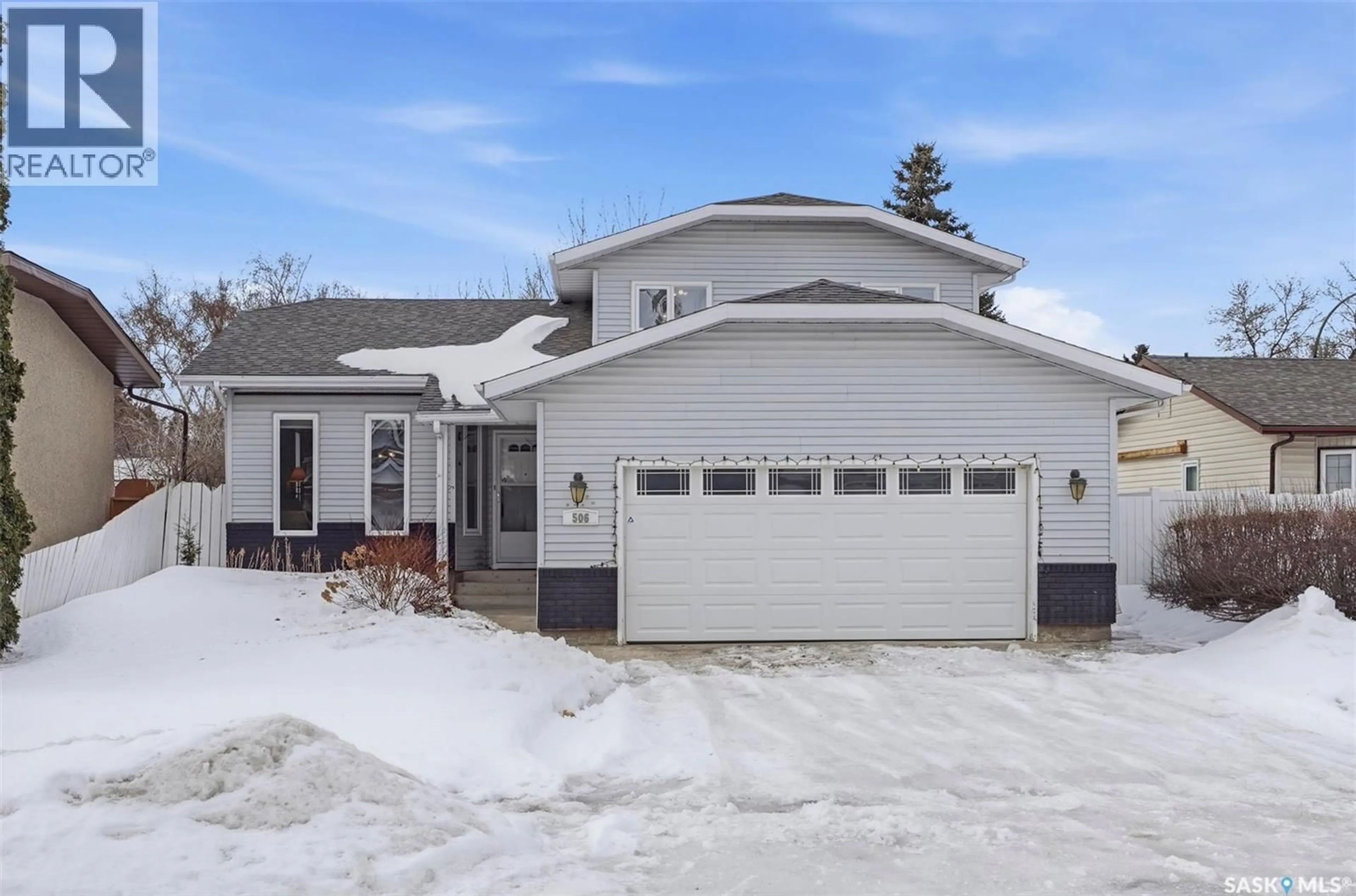 Home with vinyl exterior material, street for 506 ADDIE CRESCENT, Saskatoon Saskatchewan S7K3K7