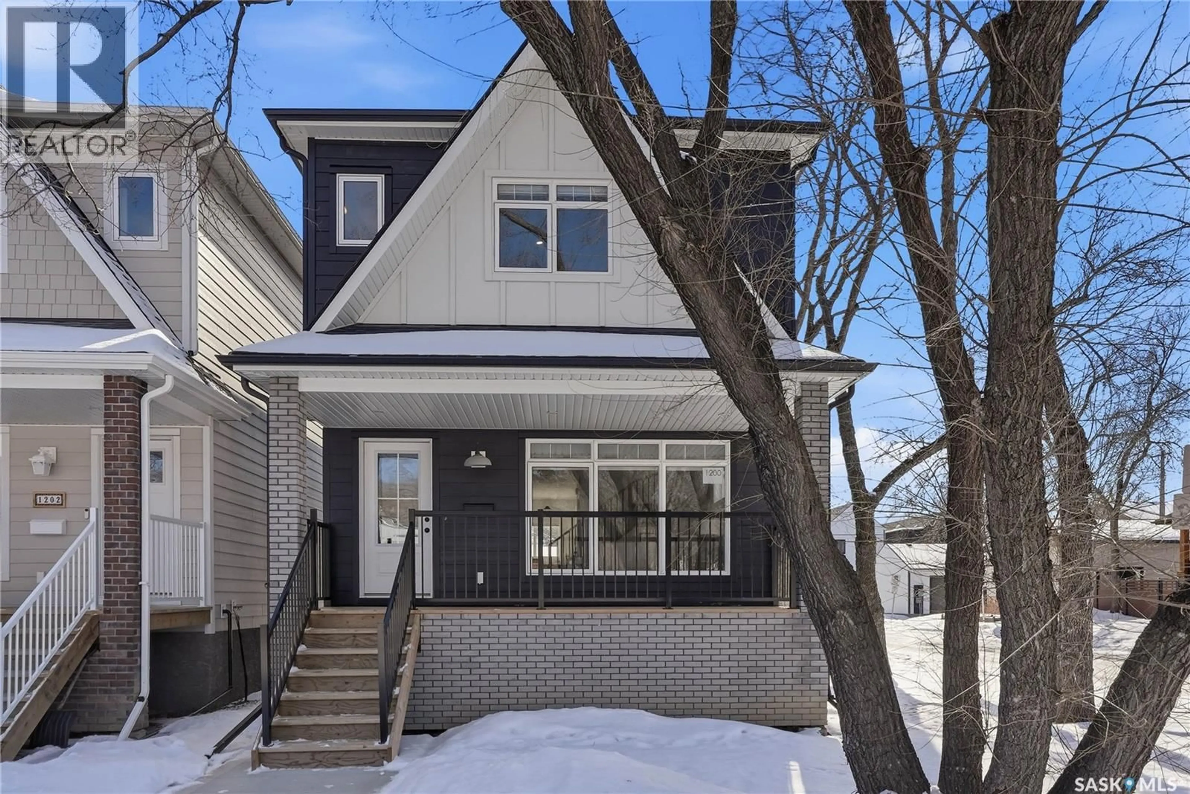 Home with brick exterior material, street for 1200 14TH STREET, Saskatoon Saskatchewan S7H0A4
