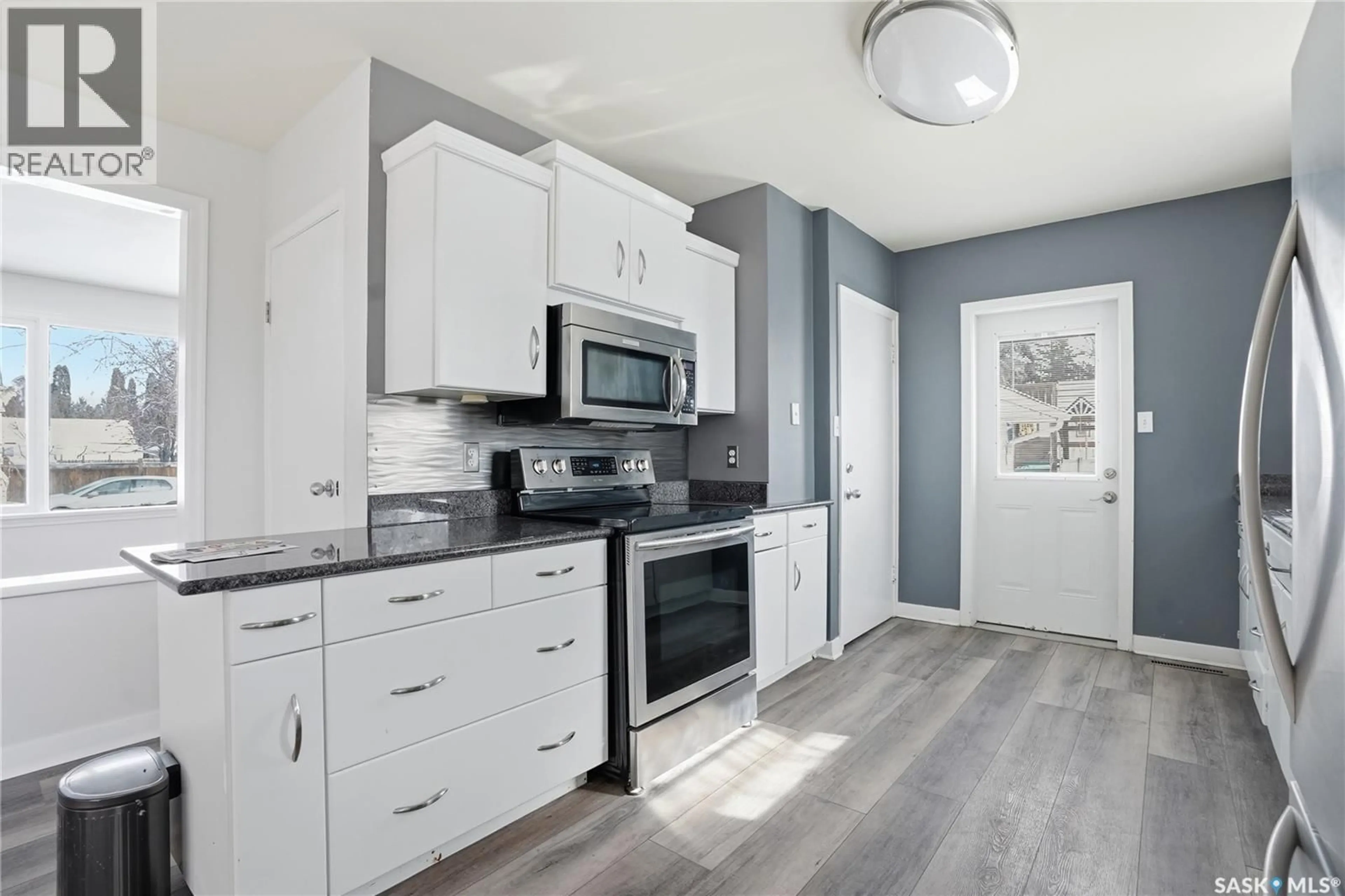 Open concept kitchen, ceramic/tile floor for 1501 WIGGINS AVENUE, Saskatoon Saskatchewan S7H2J7