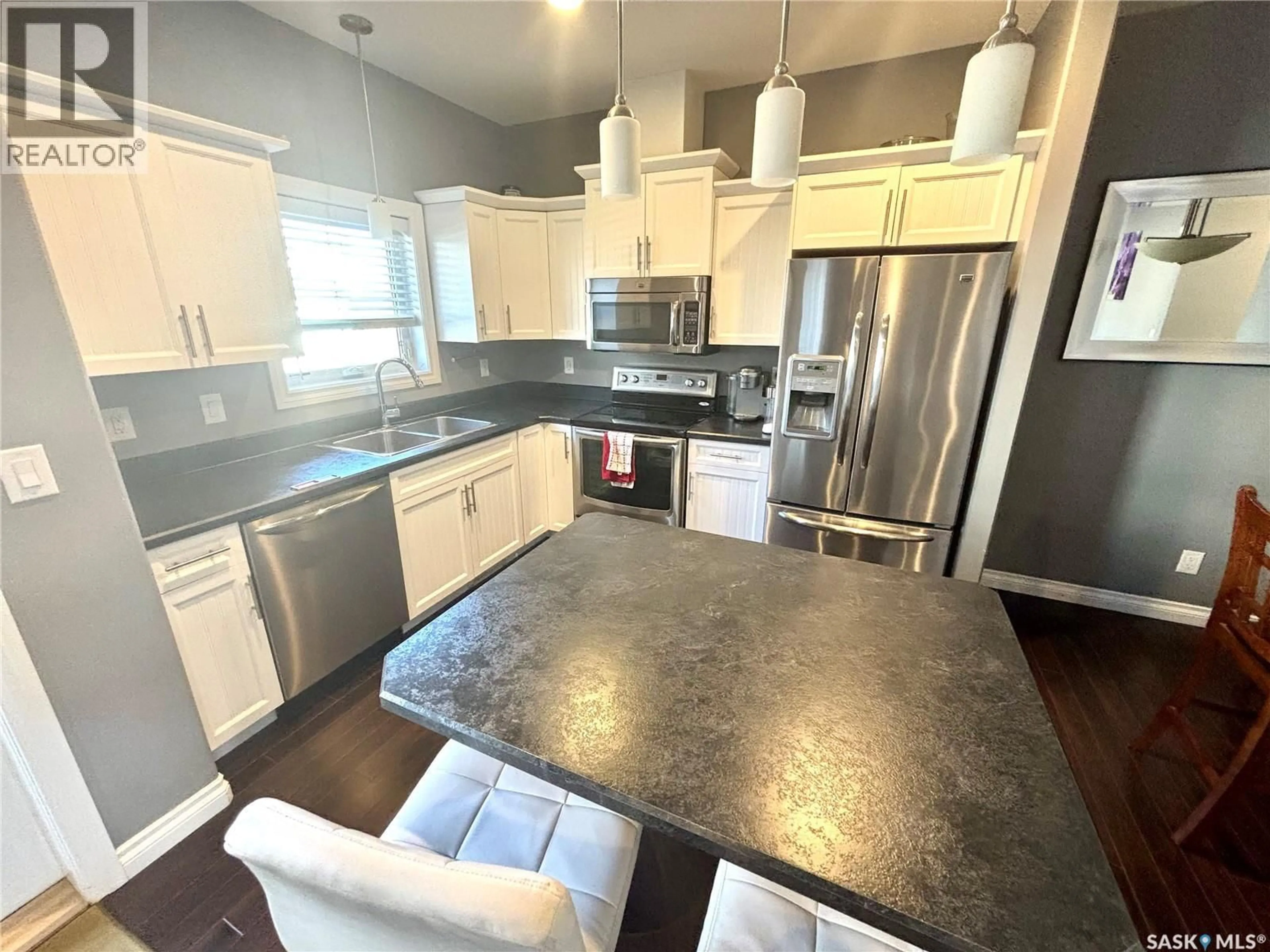 Open concept kitchen, unknown for 104 ATTON CRESCENT, Saskatoon Saskatchewan S7W0N9