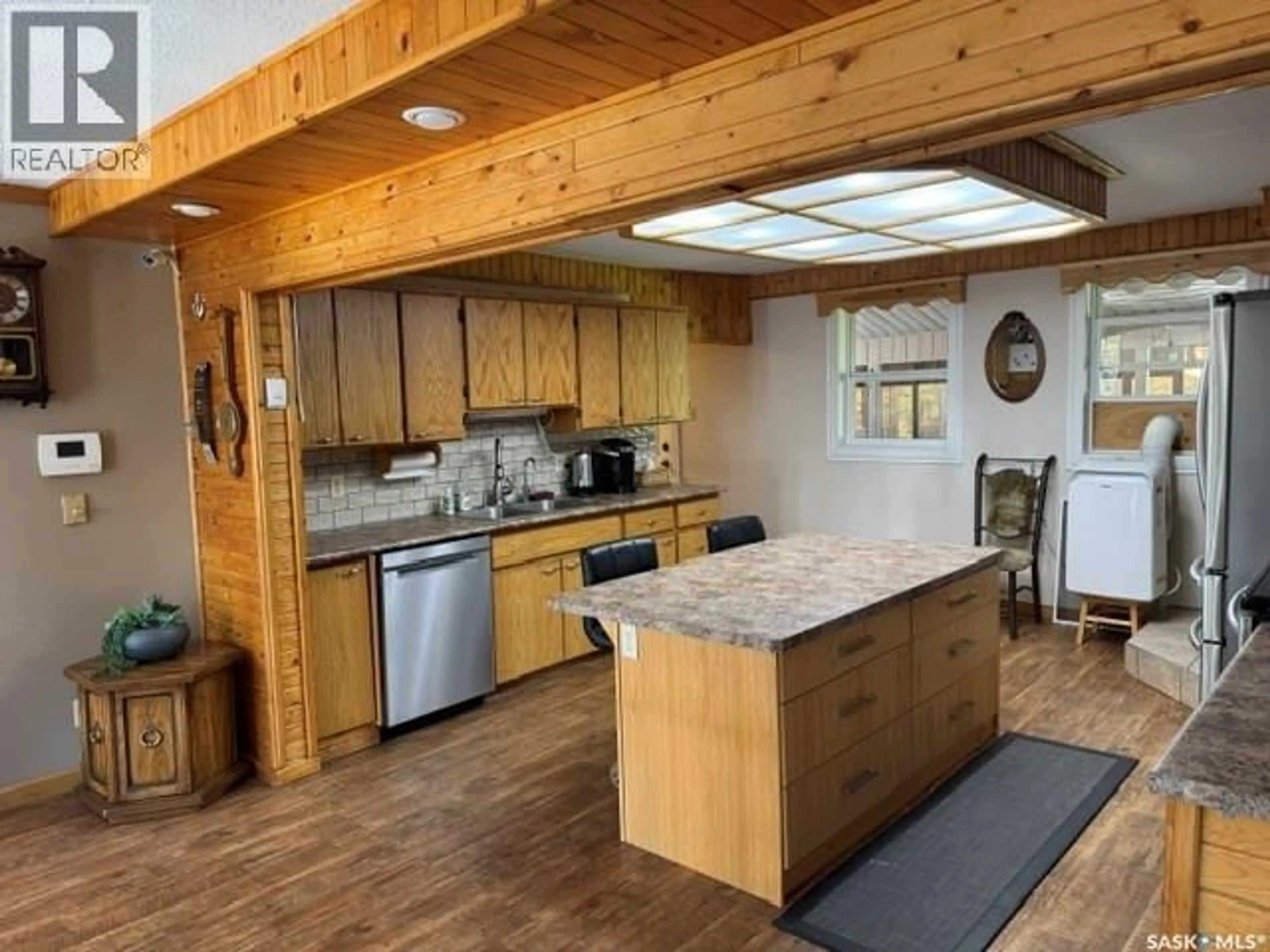 Open concept kitchen, wood/laminate floor for 922 & 926 LAKESHORE DR, Turtle Lake Saskatchewan S0M1J0