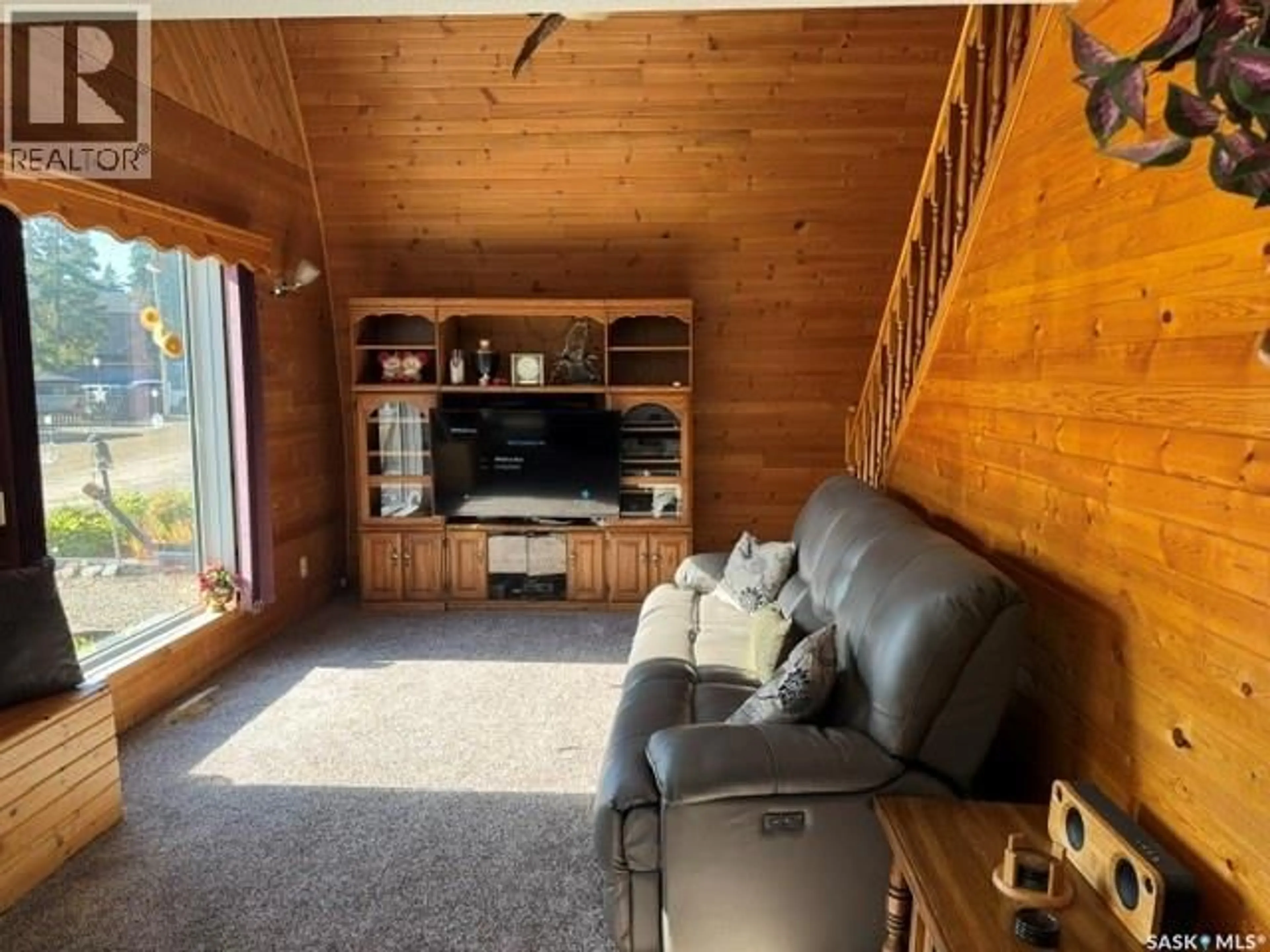 Living room with furniture, wood/laminate floor for 922 & 926 LAKESHORE DR, Turtle Lake Saskatchewan S0M1J0