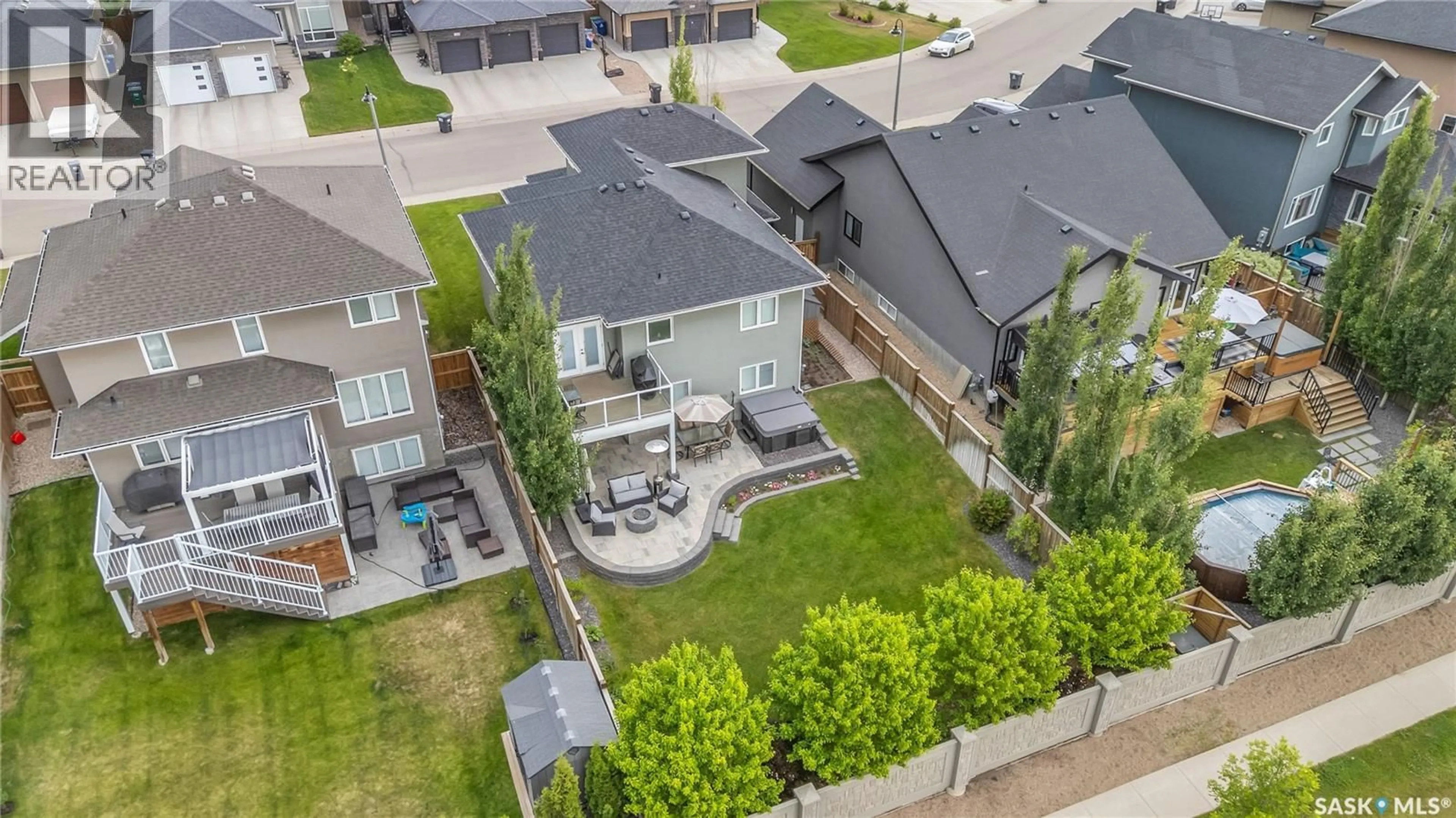 A pic from outside/outdoor area/front of a property/back of a property/a pic from drone, street for 418 TEAL LANE, Saskatoon Saskatchewan S7T0R1