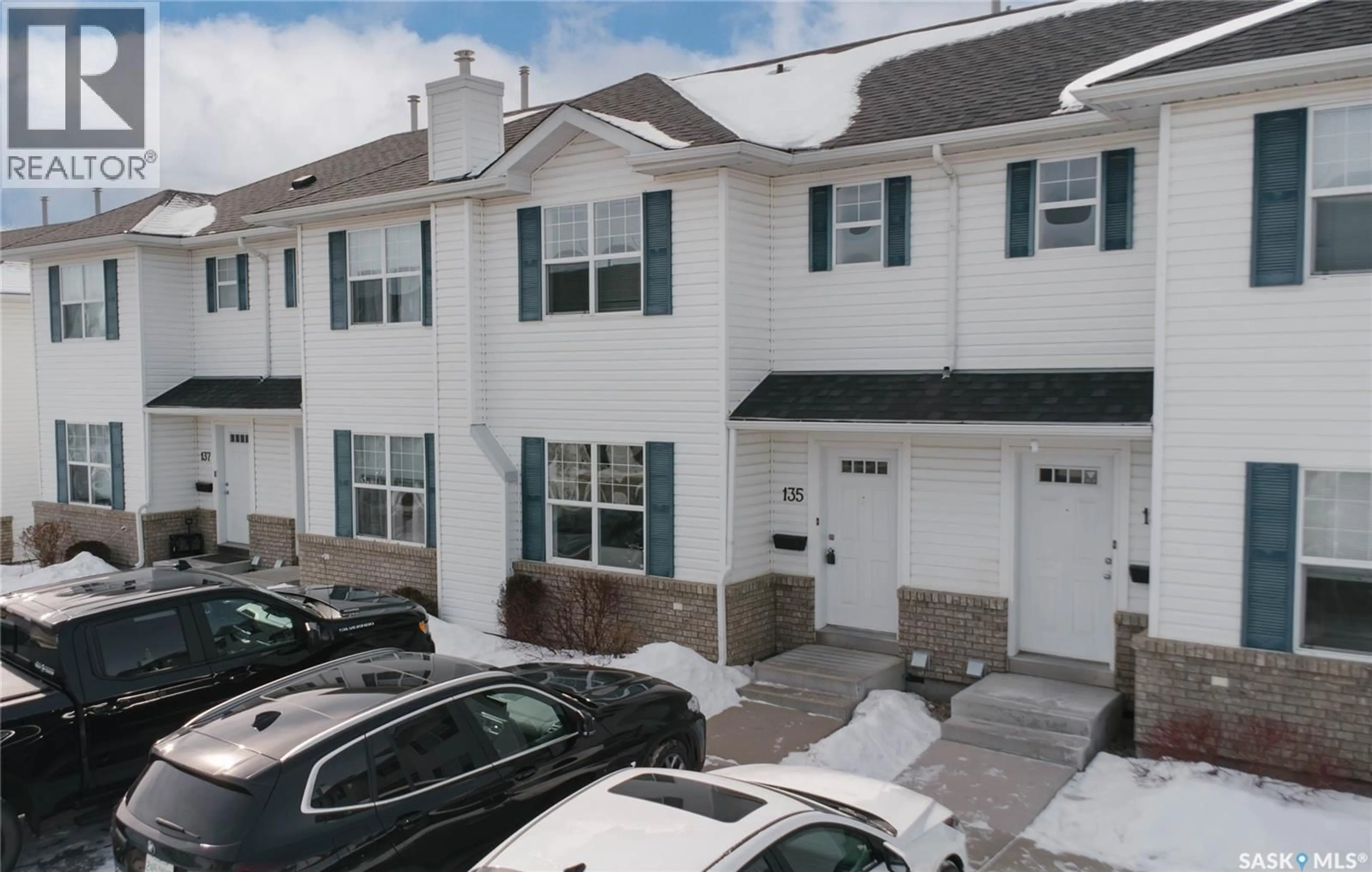 A pic from outside/outdoor area/front of a property/back of a property/a pic from drone, street for 203 - 135 HEROLD TERRACE, Saskatoon Saskatchewan S7V1H7