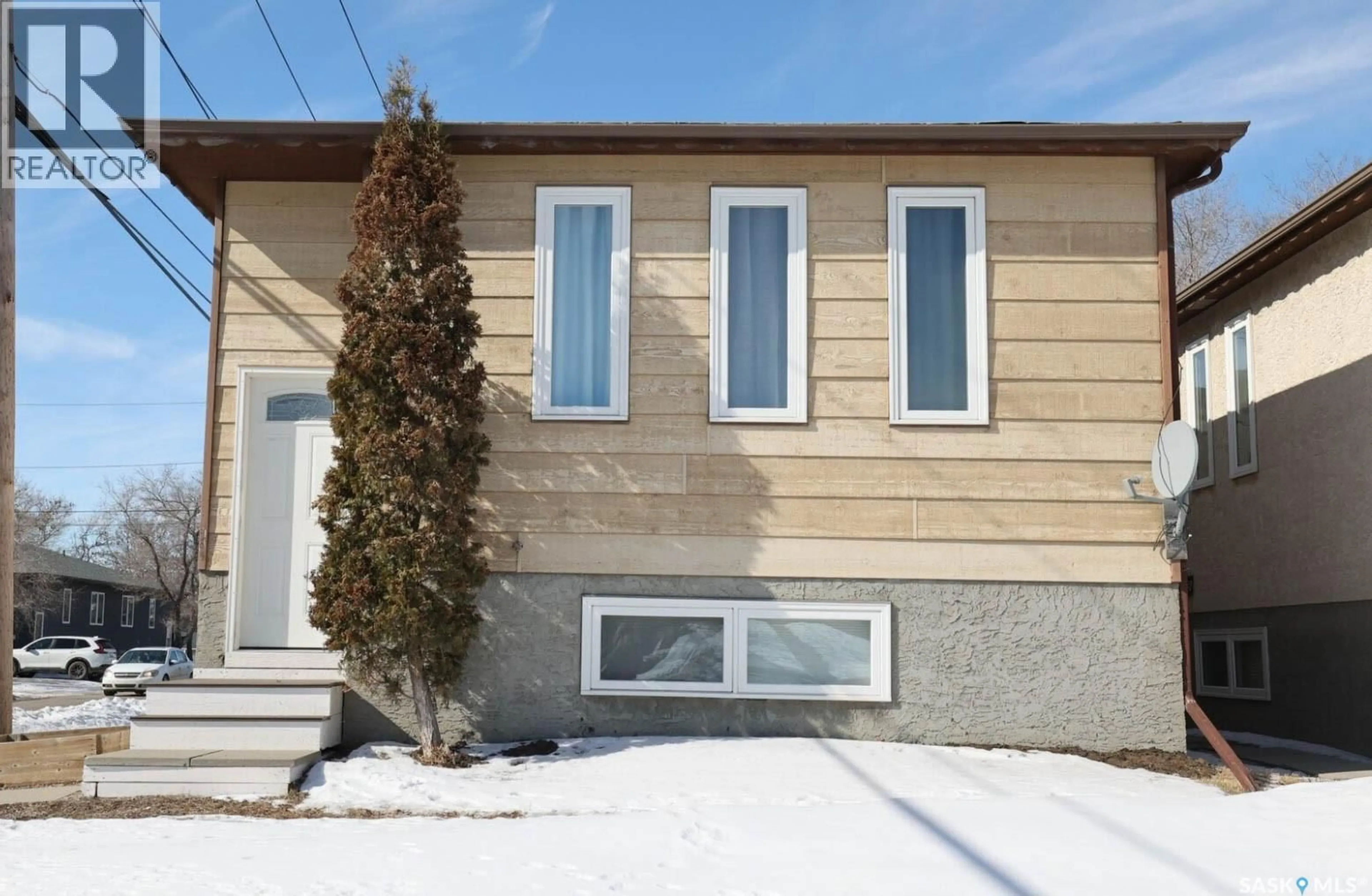 Home with vinyl exterior material, street for 1580 LACON STREET, Regina Saskatchewan S4N1Z4