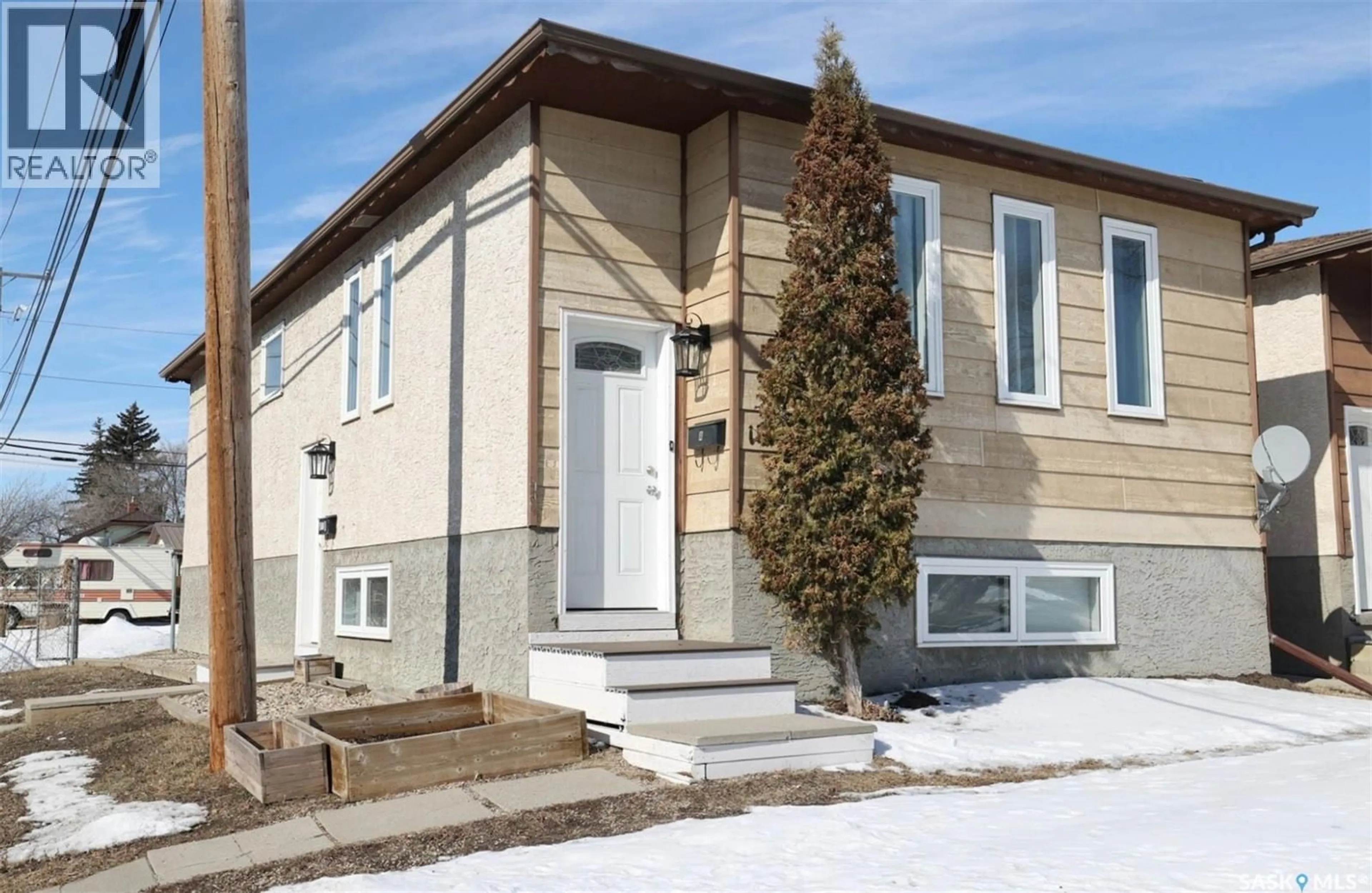 Home with vinyl exterior material, street for 1580 LACON STREET, Regina Saskatchewan S4N1Z4