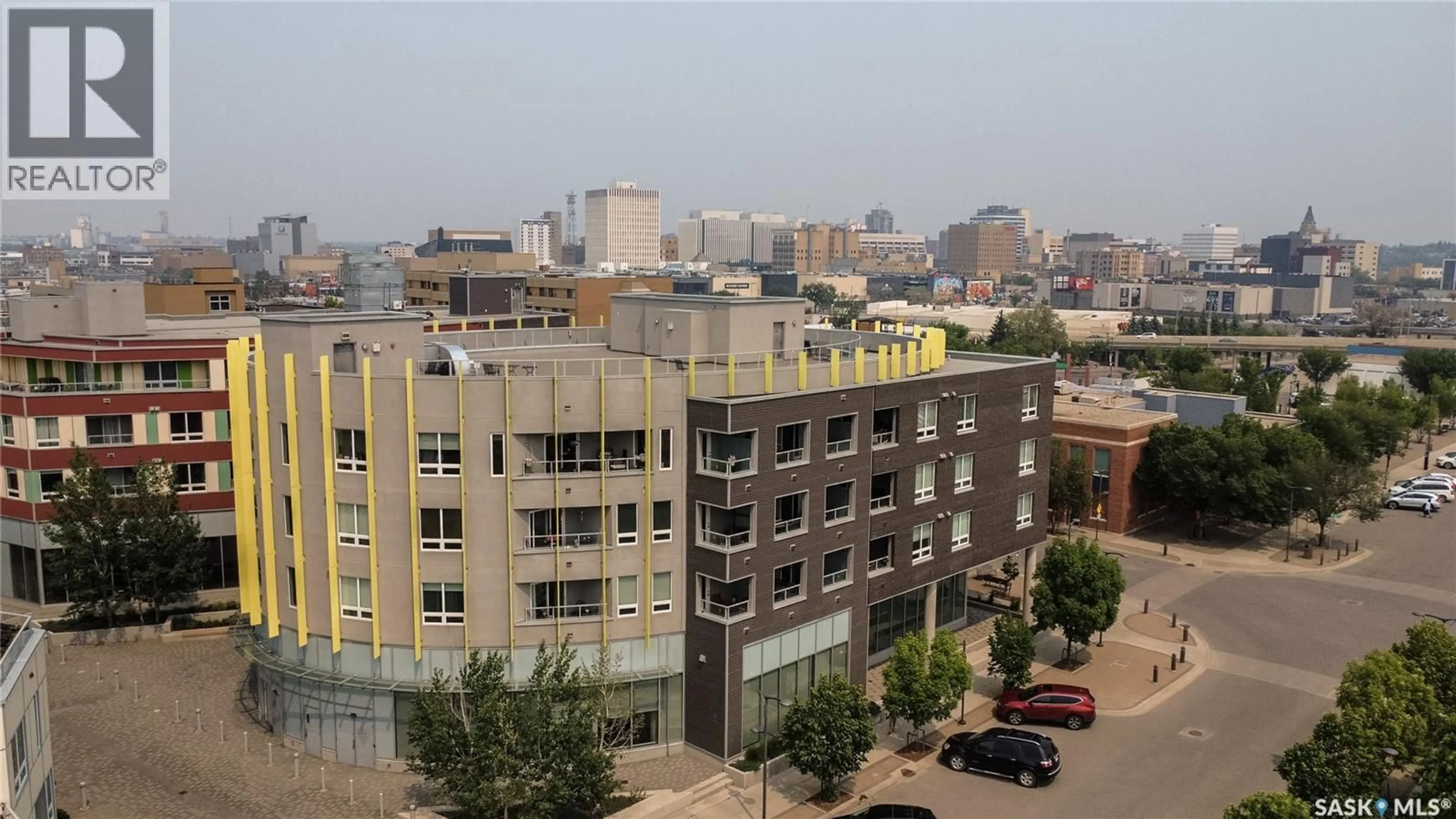 Patio, city buildings view from balcony for S - 403 409 B AVENUE, Saskatoon Saskatchewan S7M5M8
