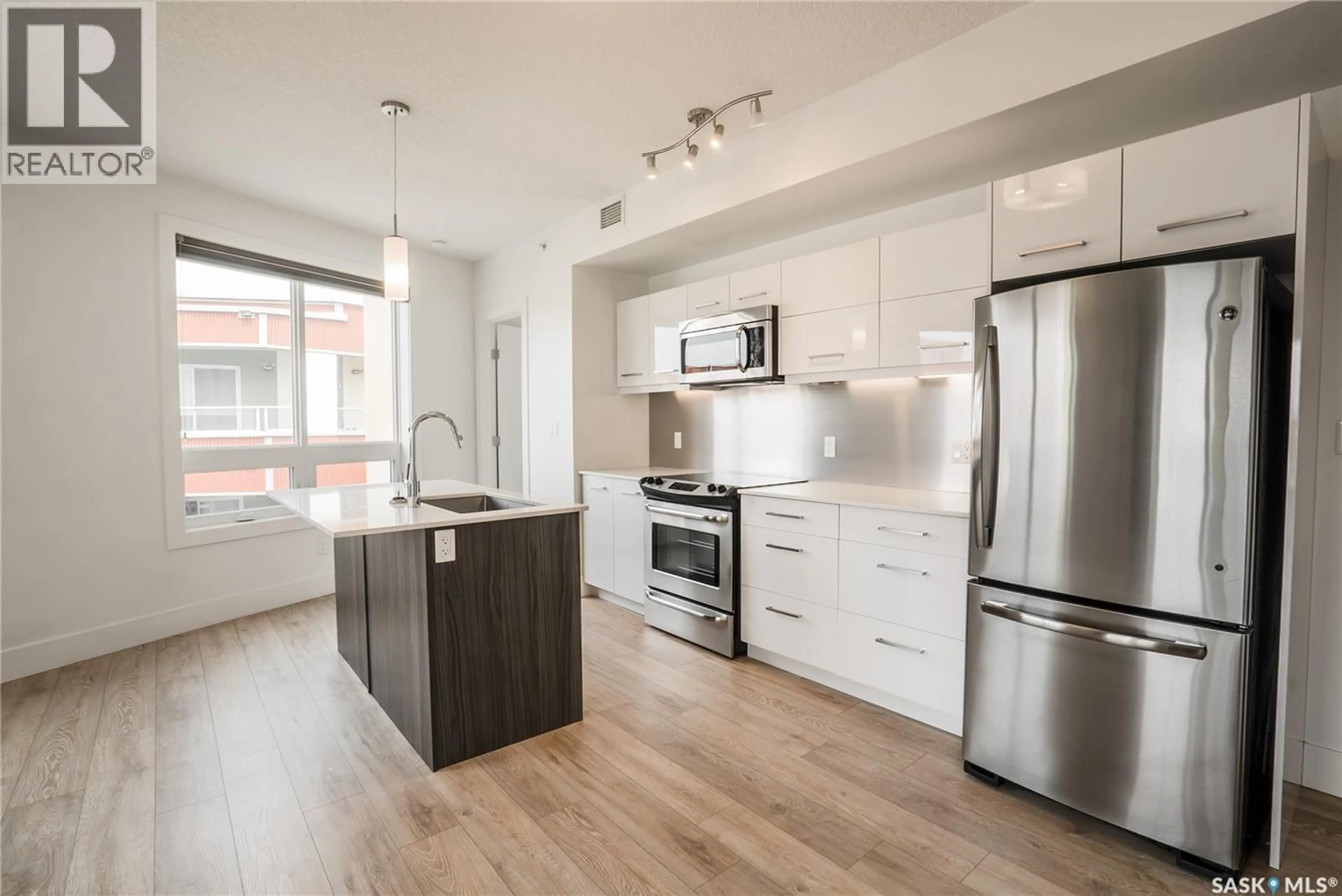 Open concept kitchen, unknown for S - 403 409 B AVENUE, Saskatoon Saskatchewan S7M5M8