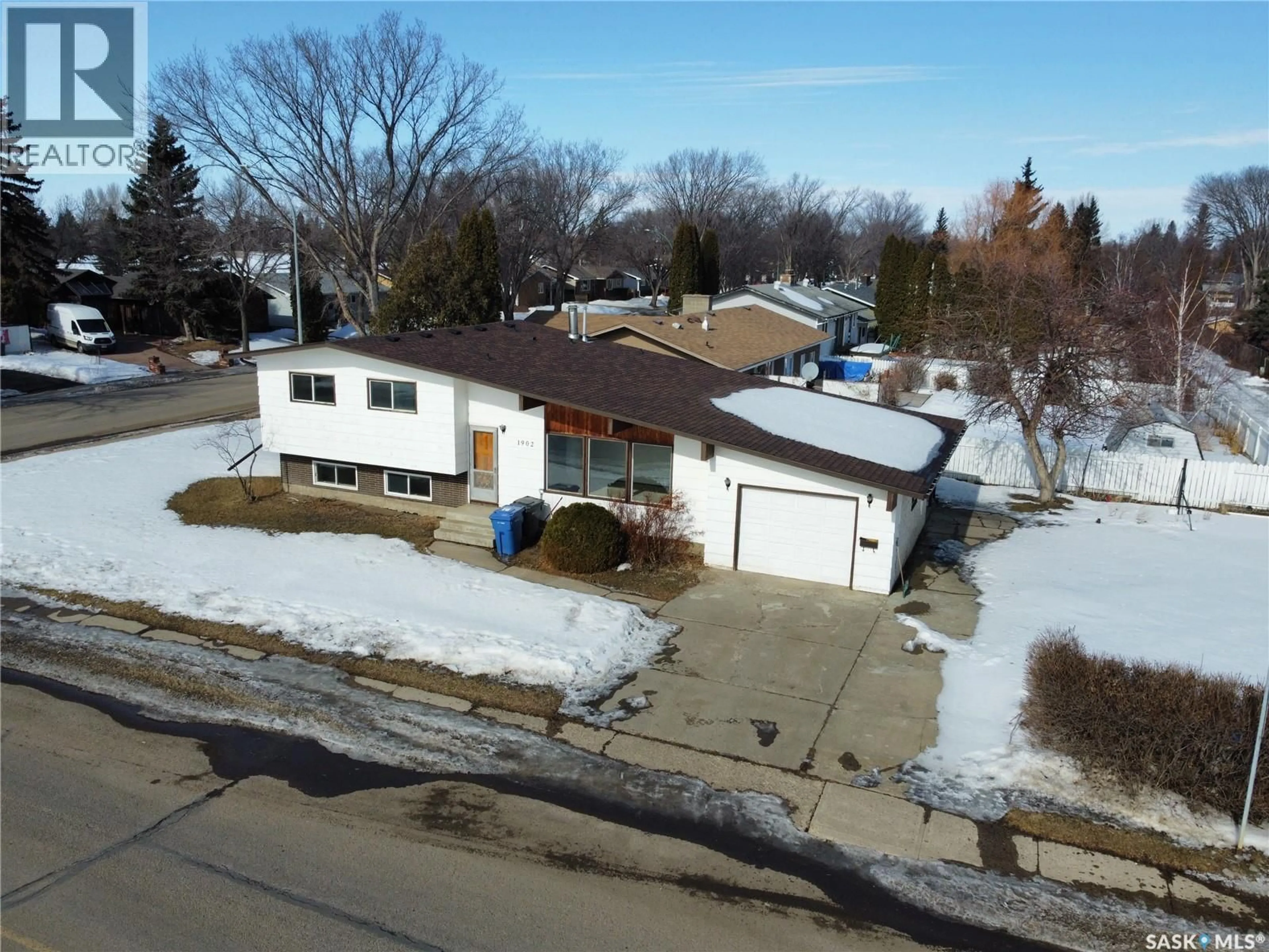 A pic from outside/outdoor area/front of a property/back of a property/a pic from drone, street for 1902 95TH STREET, North Battleford Saskatchewan S9A3C7