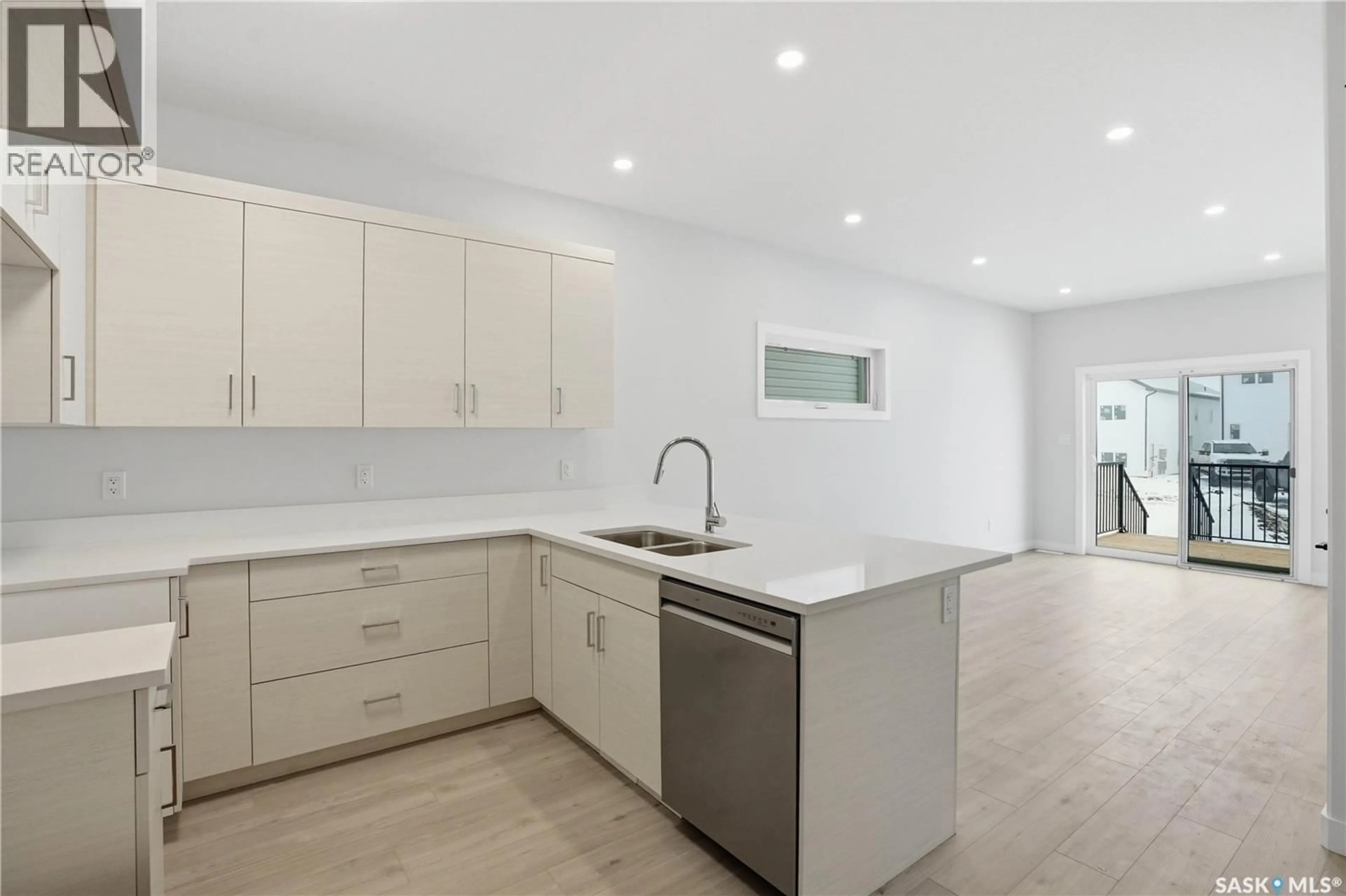 Open concept kitchen, ceramic/tile floor for 527 SHARMA CRESCENT, Saskatoon Saskatchewan S7W1K5