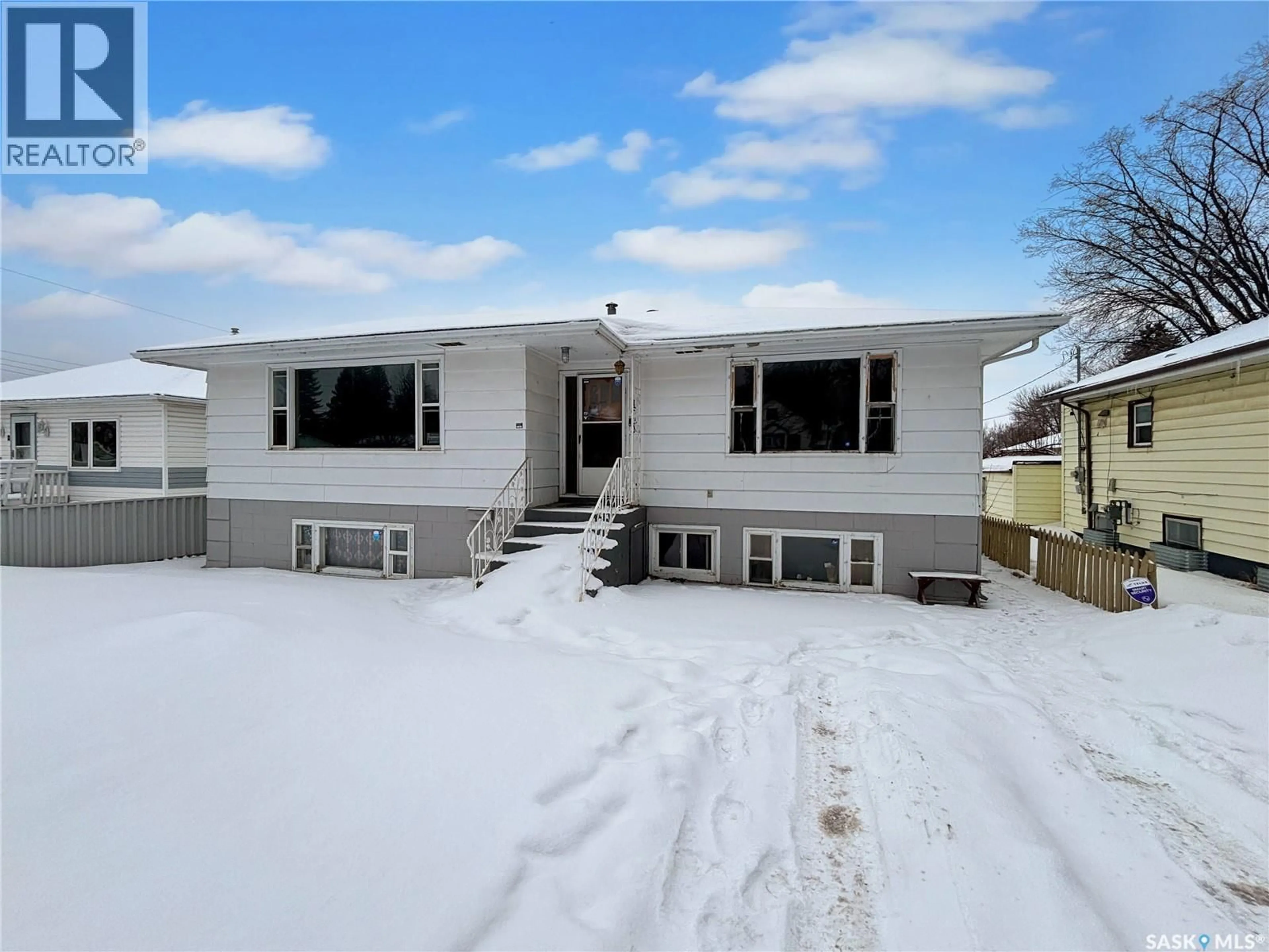 Home with vinyl exterior material, street for 1623 19TH STREET, Saskatoon Saskatchewan S7M1C5