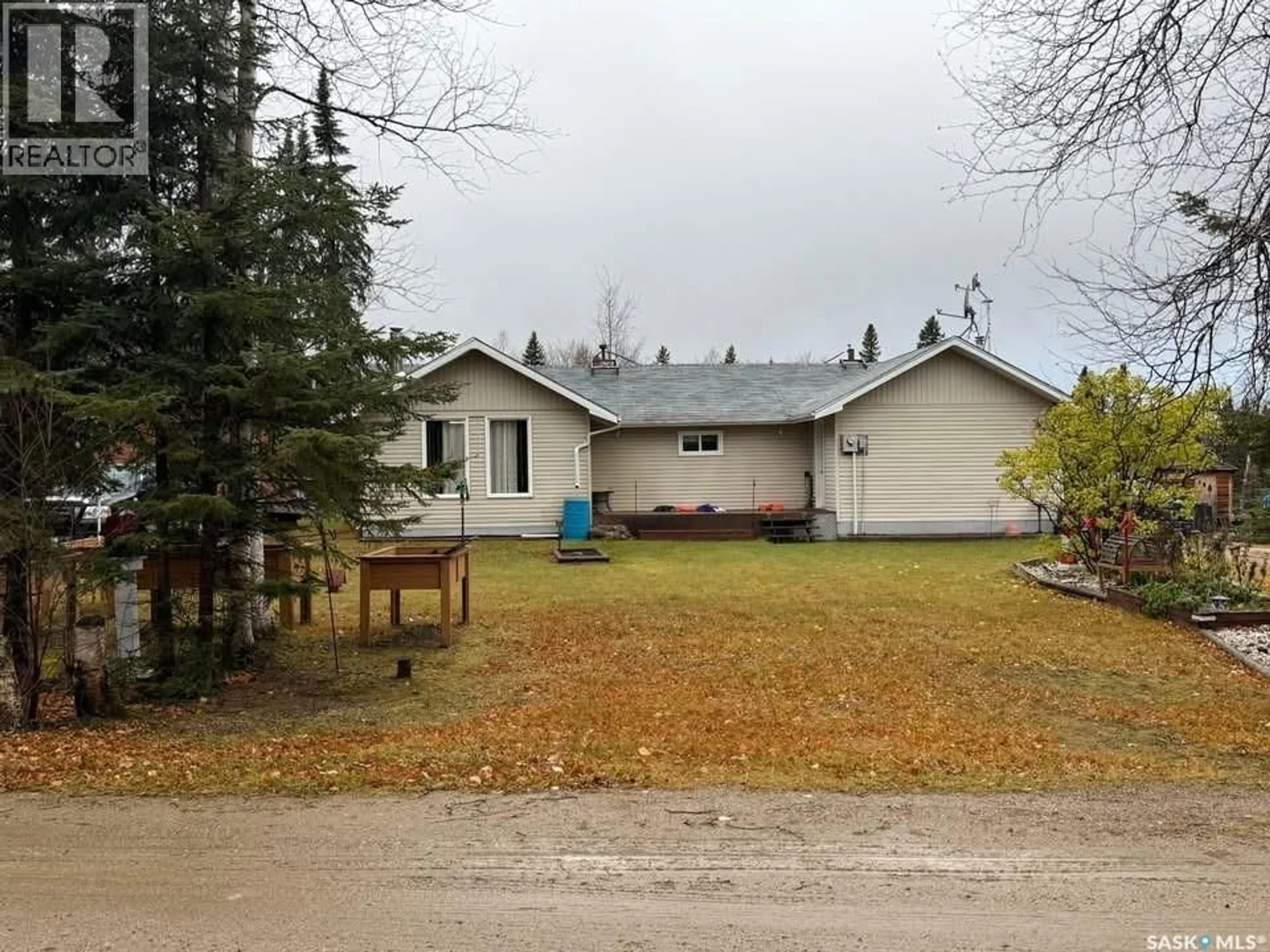 A pic from outside/outdoor area/front of a property/back of a property/a pic from drone, unknown for 711 WASKOS DRIVE, Northern Admin District Saskatchewan S0J1L0