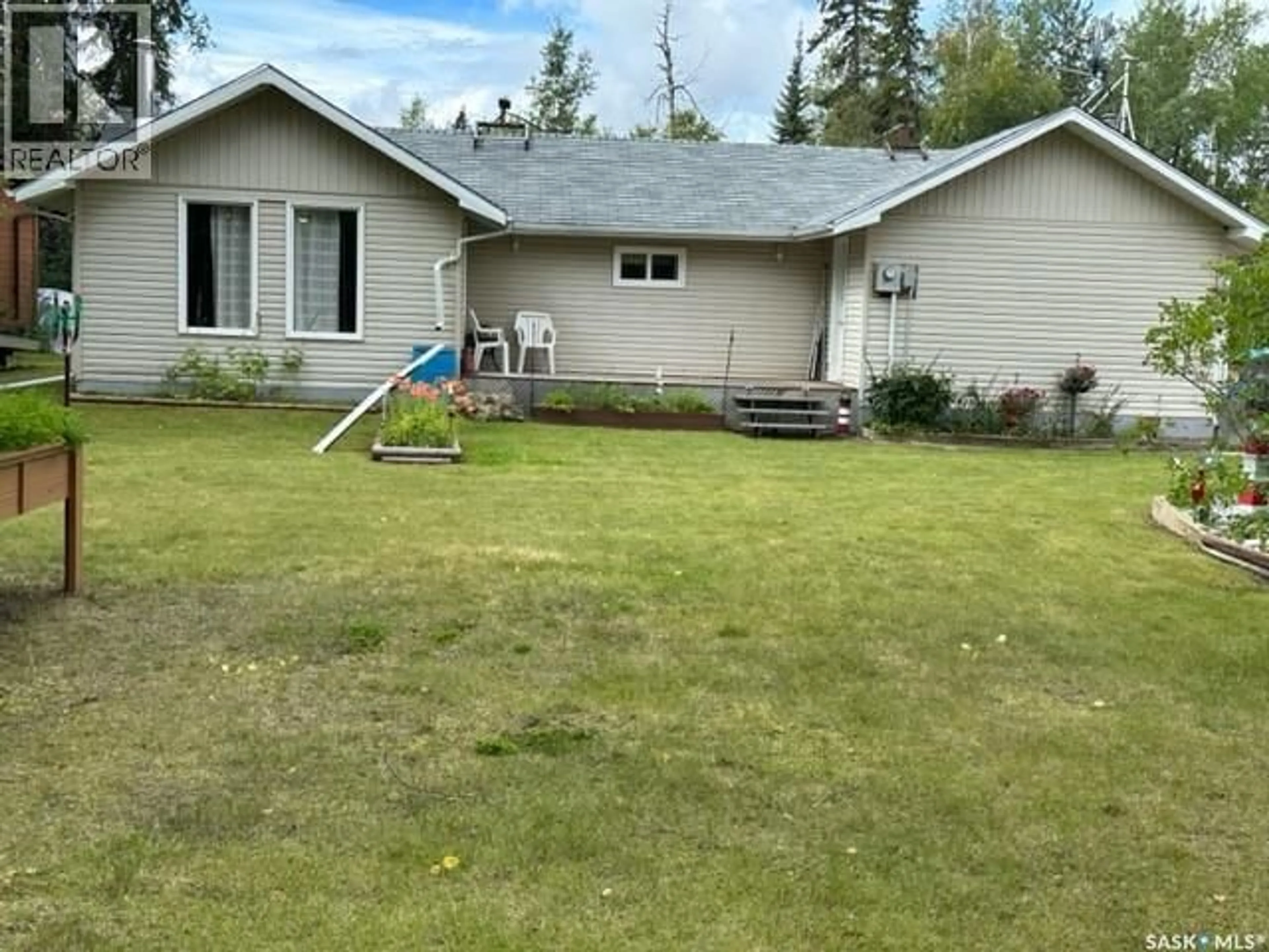 A pic from outside/outdoor area/front of a property/back of a property/a pic from drone, unknown for 711 WASKOS DRIVE, Northern Admin District Saskatchewan S0J1L0