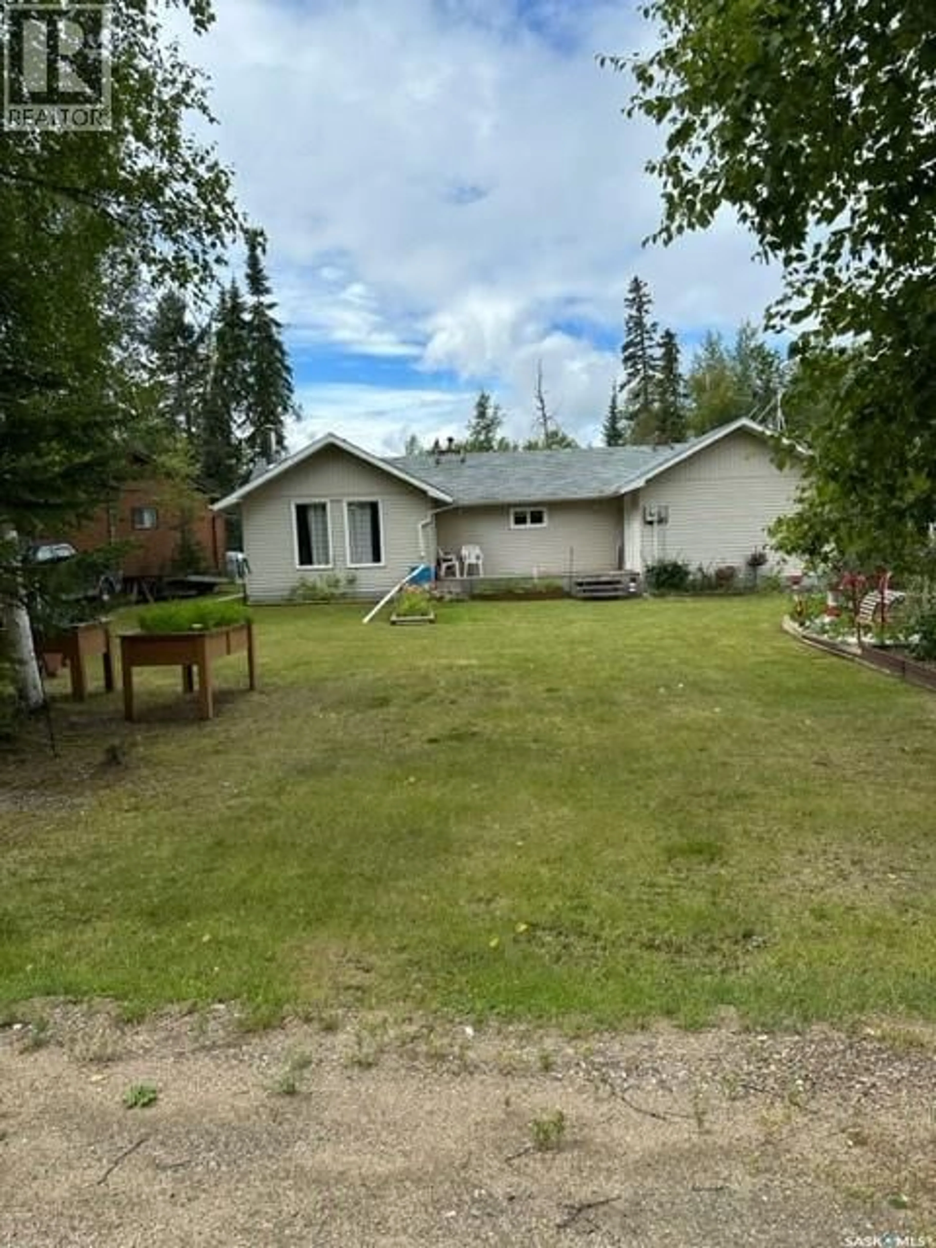 A pic from outside/outdoor area/front of a property/back of a property/a pic from drone, unknown for 711 WASKOS DRIVE, Northern Admin District Saskatchewan S0J1L0
