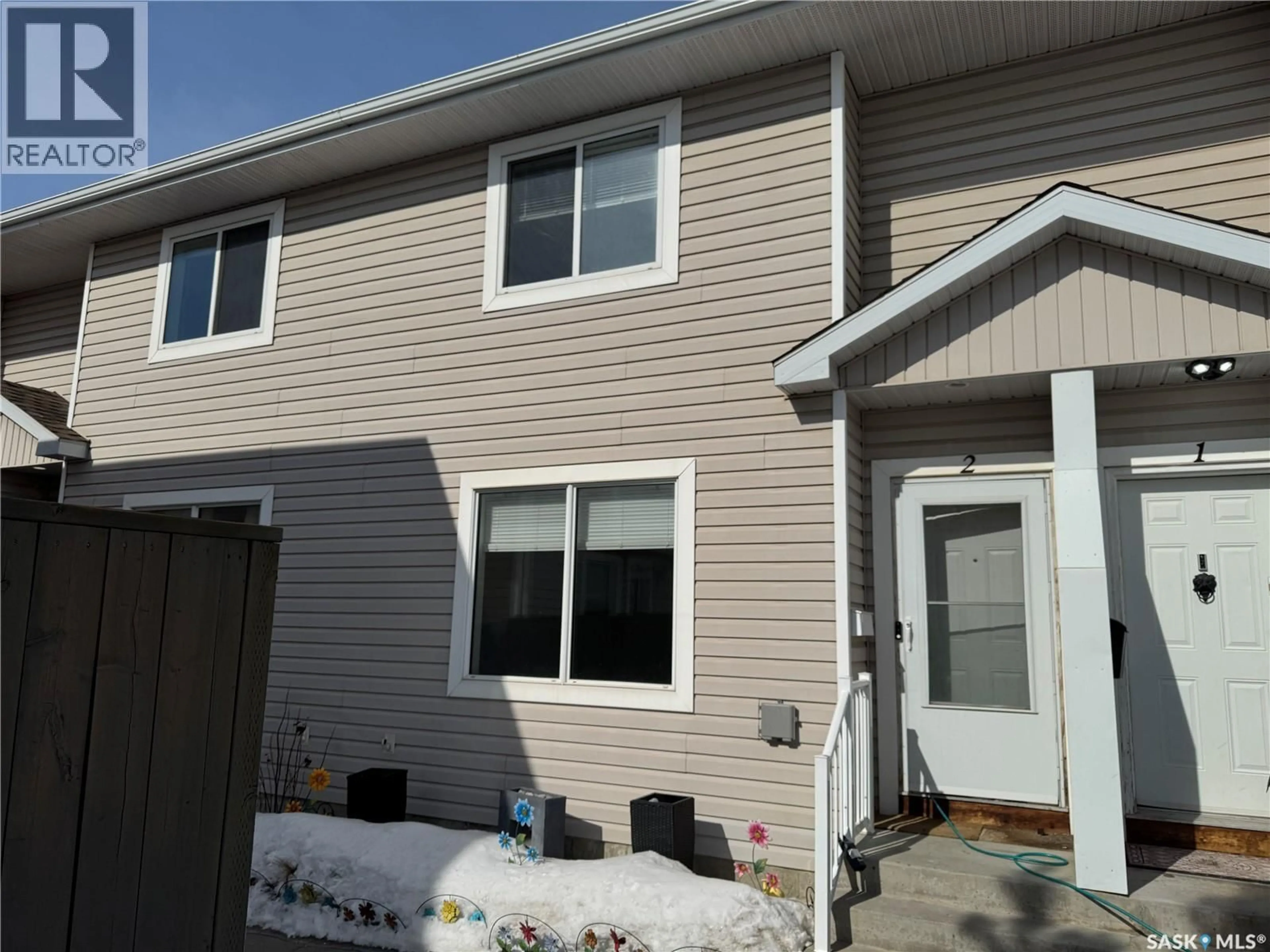 Home with vinyl exterior material, street for N - 2 802 K AVENUE, Saskatoon Saskatchewan S7L2N1
