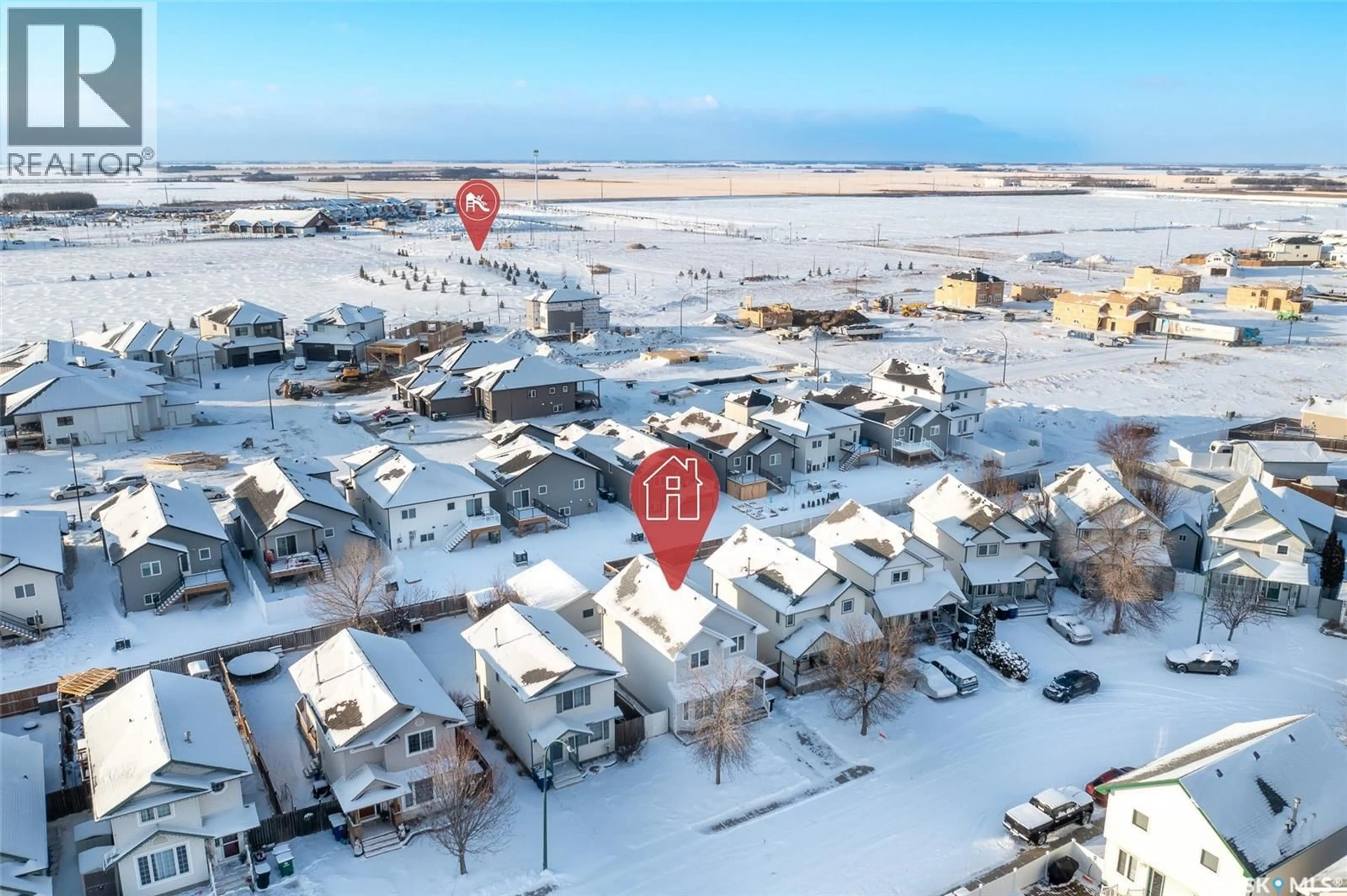 A pic from outside/outdoor area/front of a property/back of a property/a pic from drone, street for 427 CARTER WAY, Saskatoon Saskatchewan S7L7J1