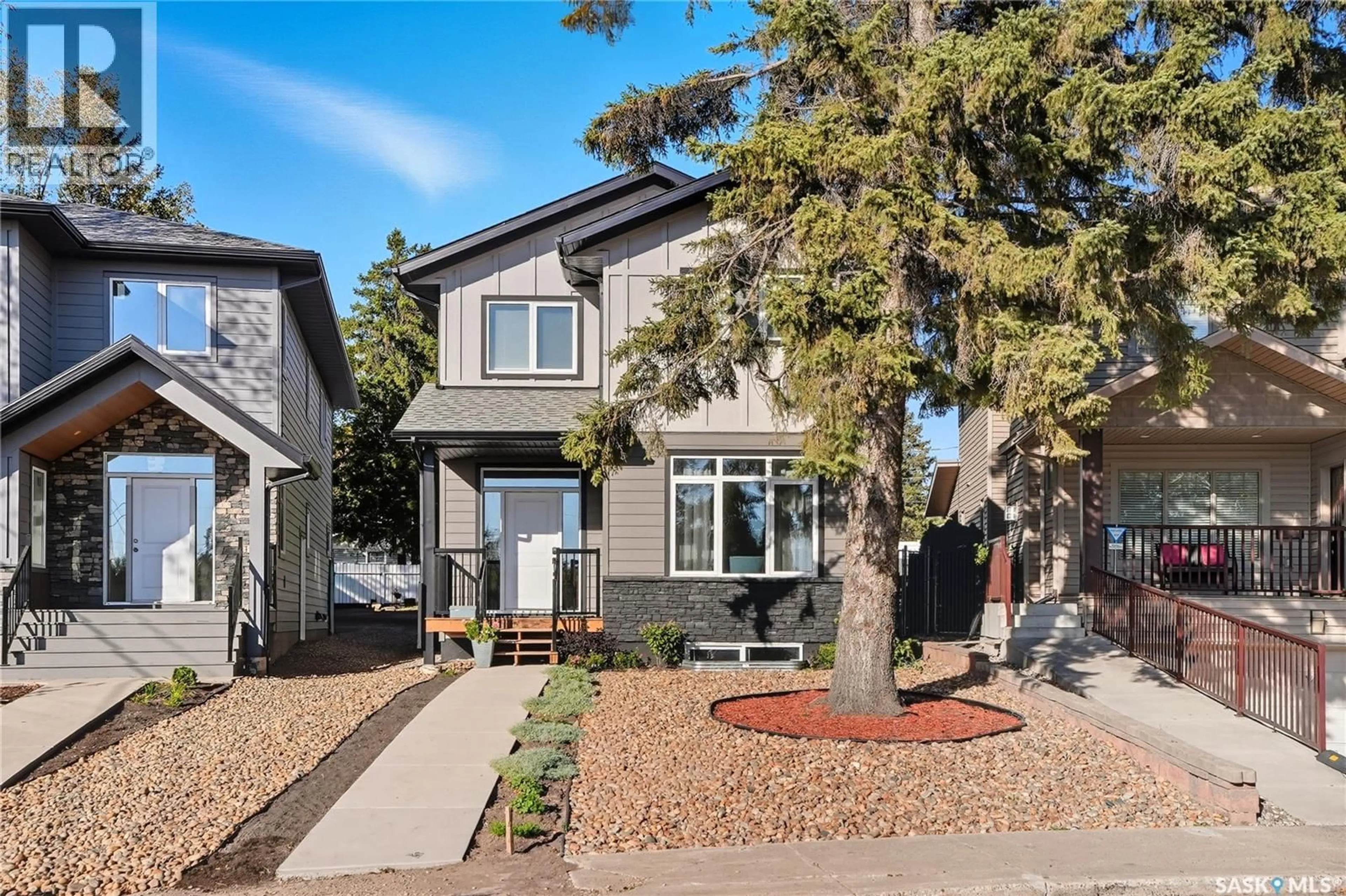 Home with brick exterior material, street for 1601b 9TH AVENUE, Saskatoon Saskatchewan S7K2Z9