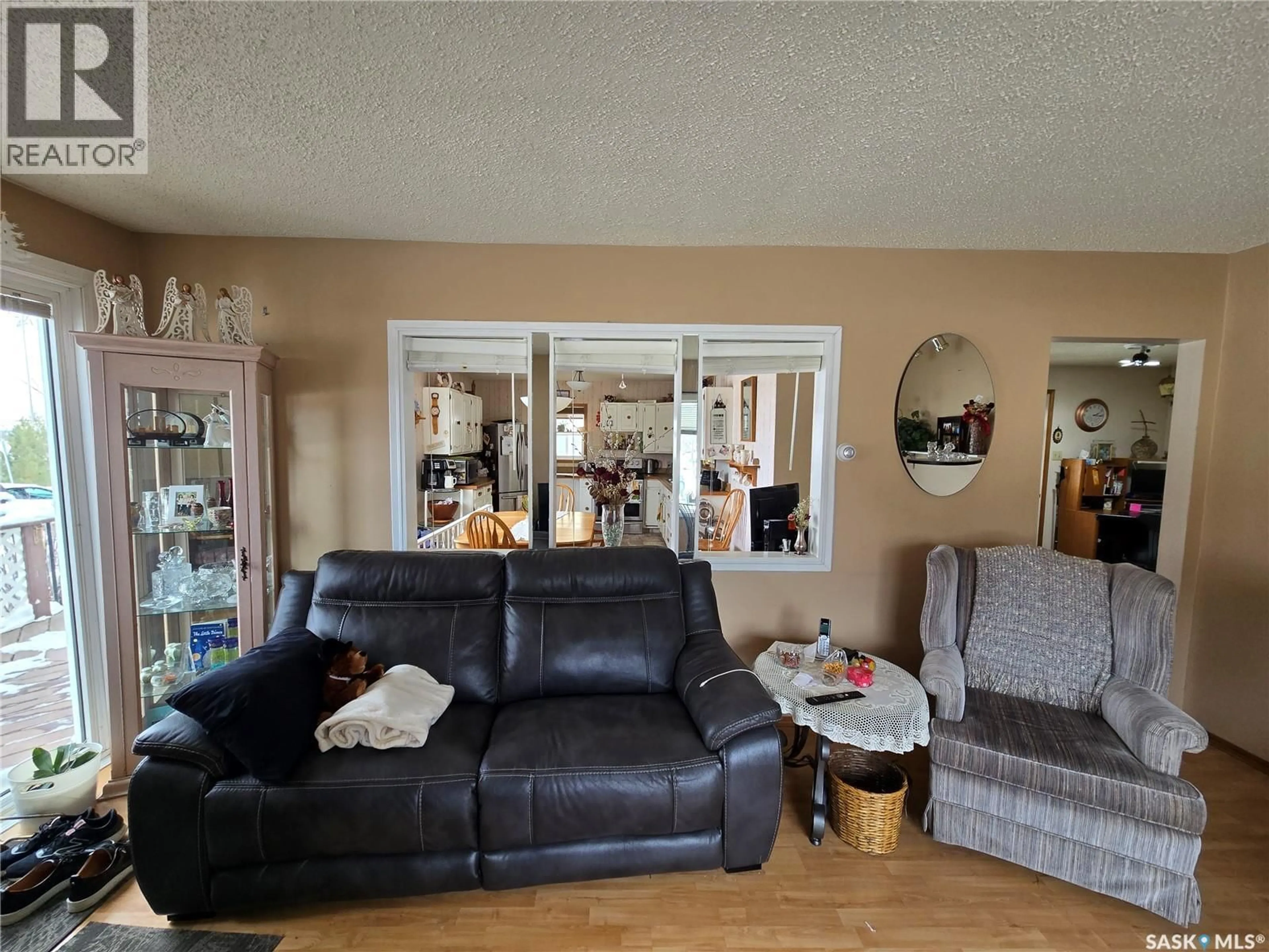 Living room with furniture, unknown for 676 3RD AVENUE, Swift Current Saskatchewan S9H2H5
