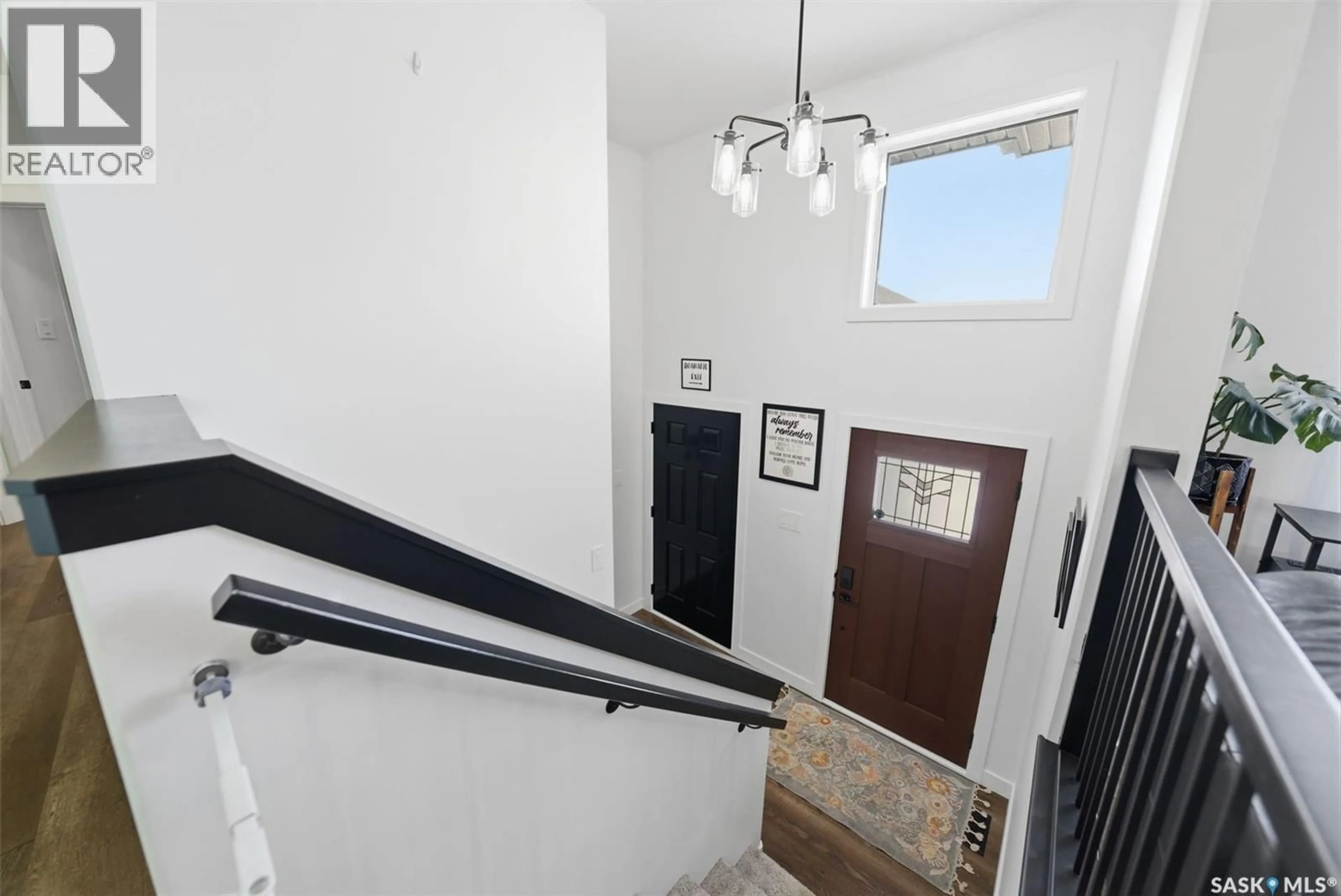 Indoor foyer for 805 WEIR CRESCENT, Warman Saskatchewan S0K4S4