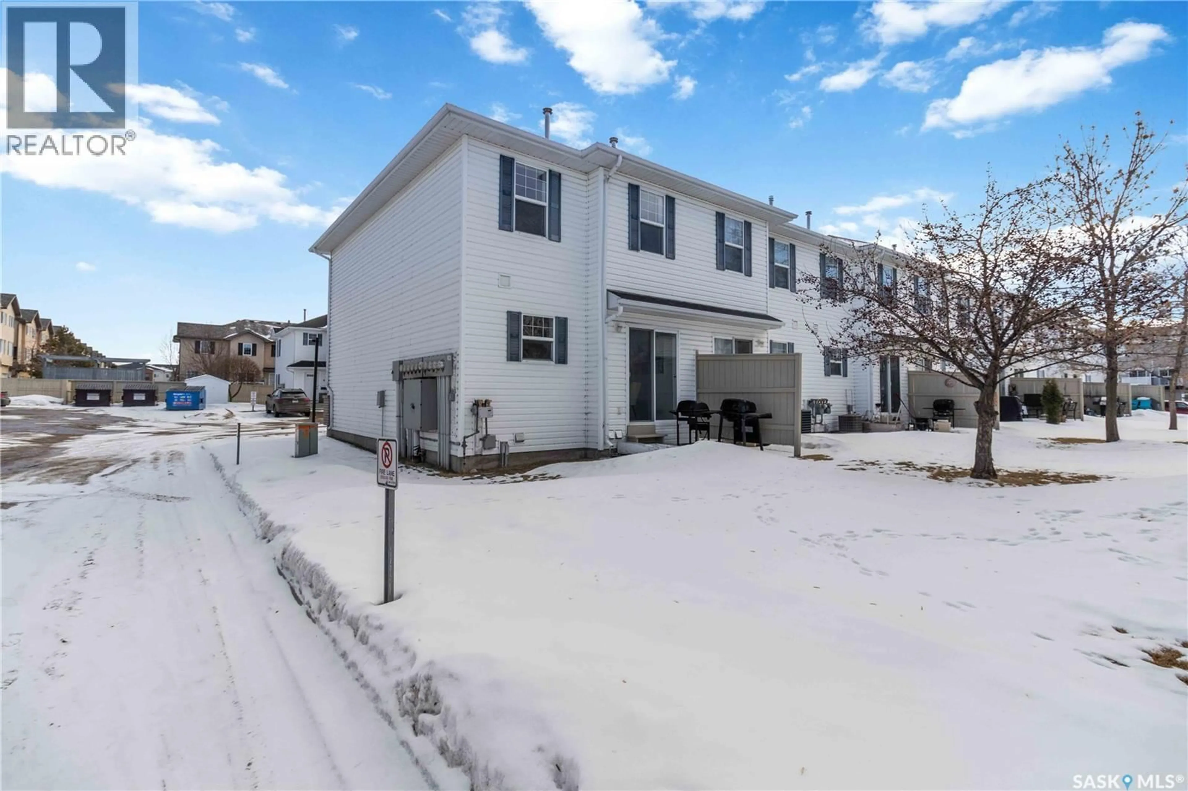 A pic from outside/outdoor area/front of a property/back of a property/a pic from drone, street for 102 - 33 PAWLYCHENKO LANE, Saskatoon Saskatchewan S7V1G9