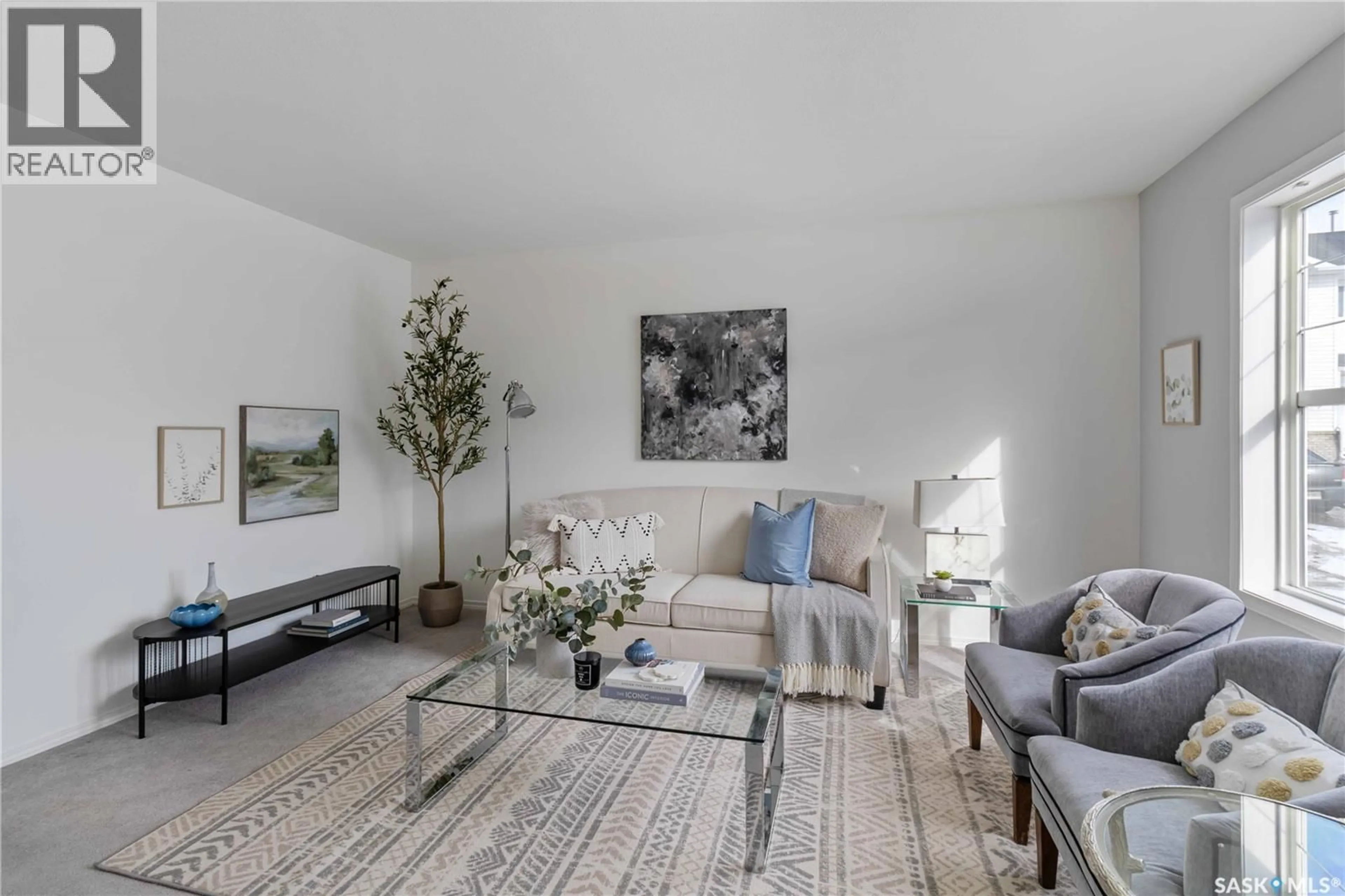 Living room with furniture, unknown for 102 - 33 PAWLYCHENKO LANE, Saskatoon Saskatchewan S7V1G9