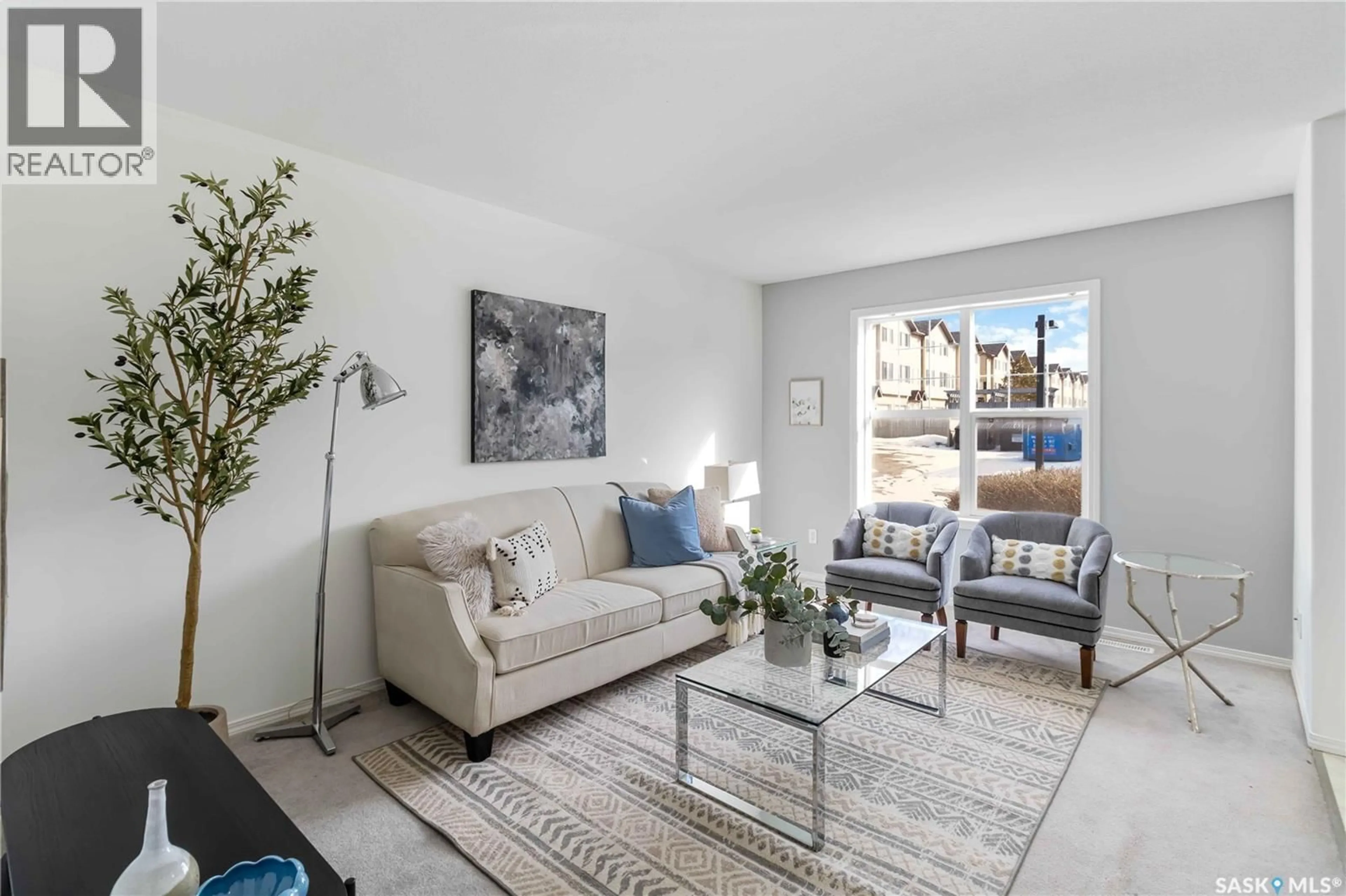 Living room with furniture, unknown for 102 - 33 PAWLYCHENKO LANE, Saskatoon Saskatchewan S7V1G9