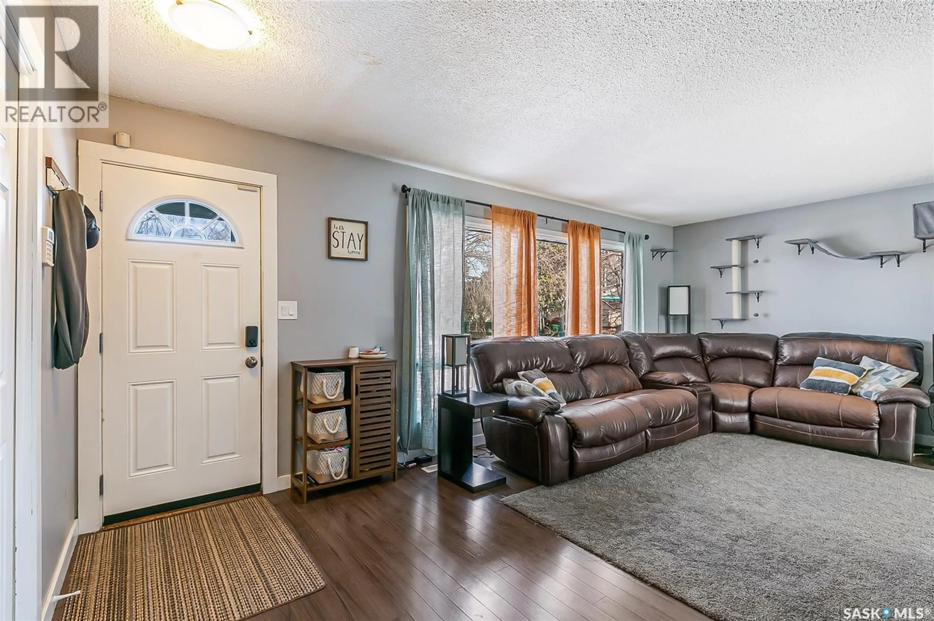 Living room with furniture, unknown for 35 COOPER CRESCENT, Regina Saskatchewan S4R4J8
