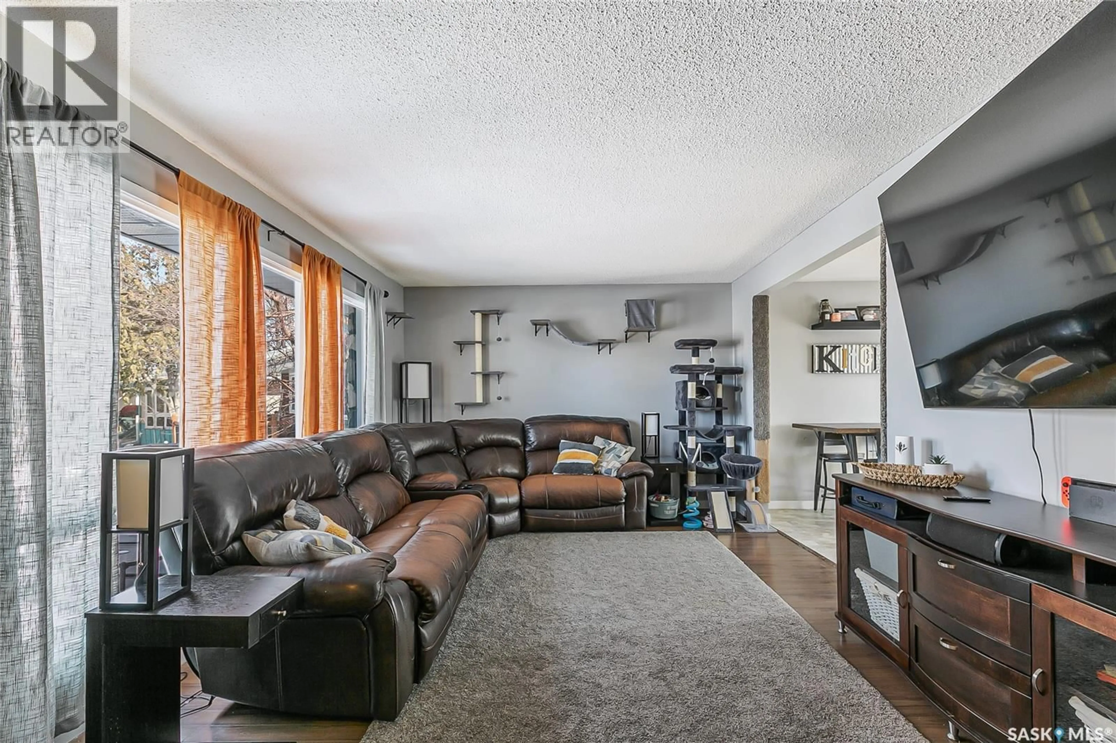 Living room with furniture, unknown for 35 COOPER CRESCENT, Regina Saskatchewan S4R4J8