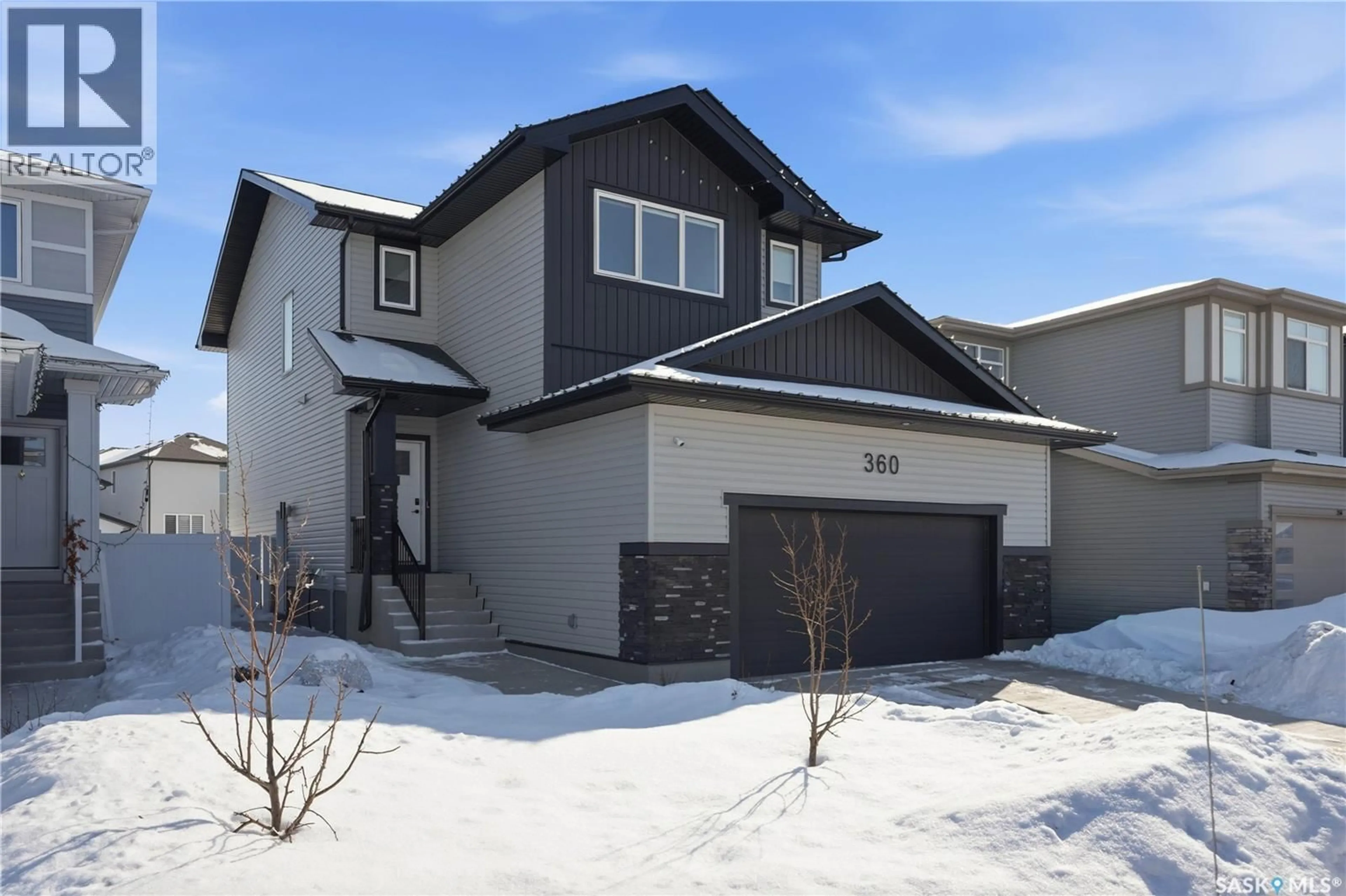 Home with vinyl exterior material, street for 360 BARRETT STREET, Saskatoon Saskatchewan S7W1E7