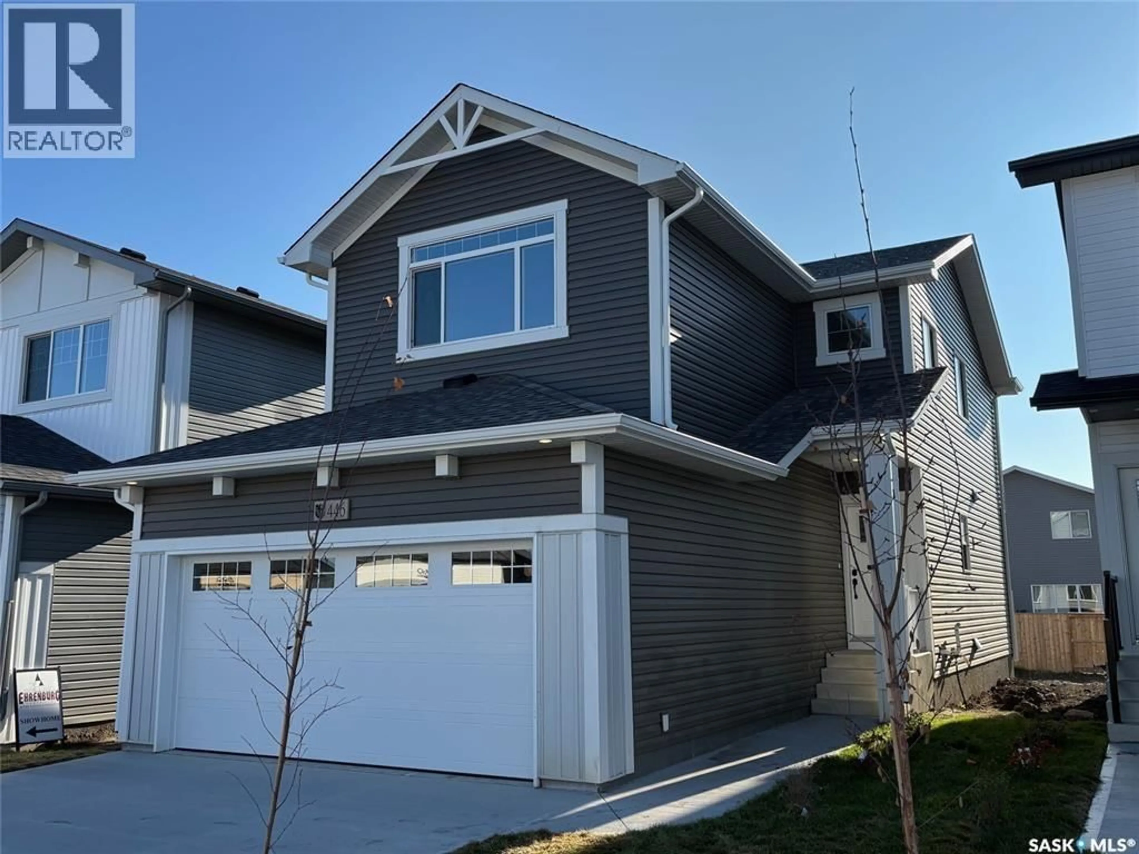 Home with vinyl exterior material, street for 258 KOSTIUK CRESCENT, Saskatoon Saskatchewan S7V1R7