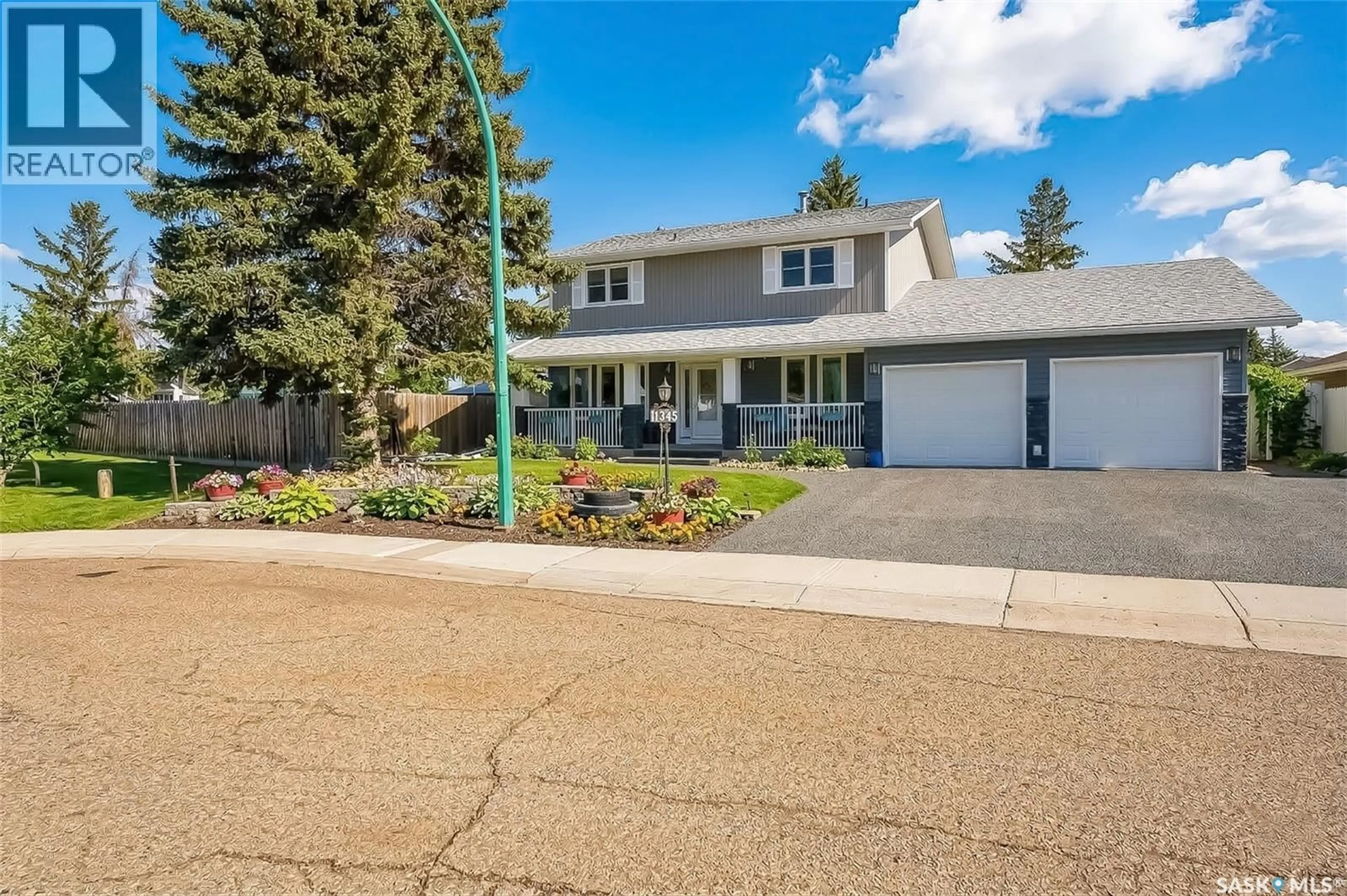 Home with vinyl exterior material, street for 1345 PRINCE CRESCENT, Moose Jaw Saskatchewan S6H6E6