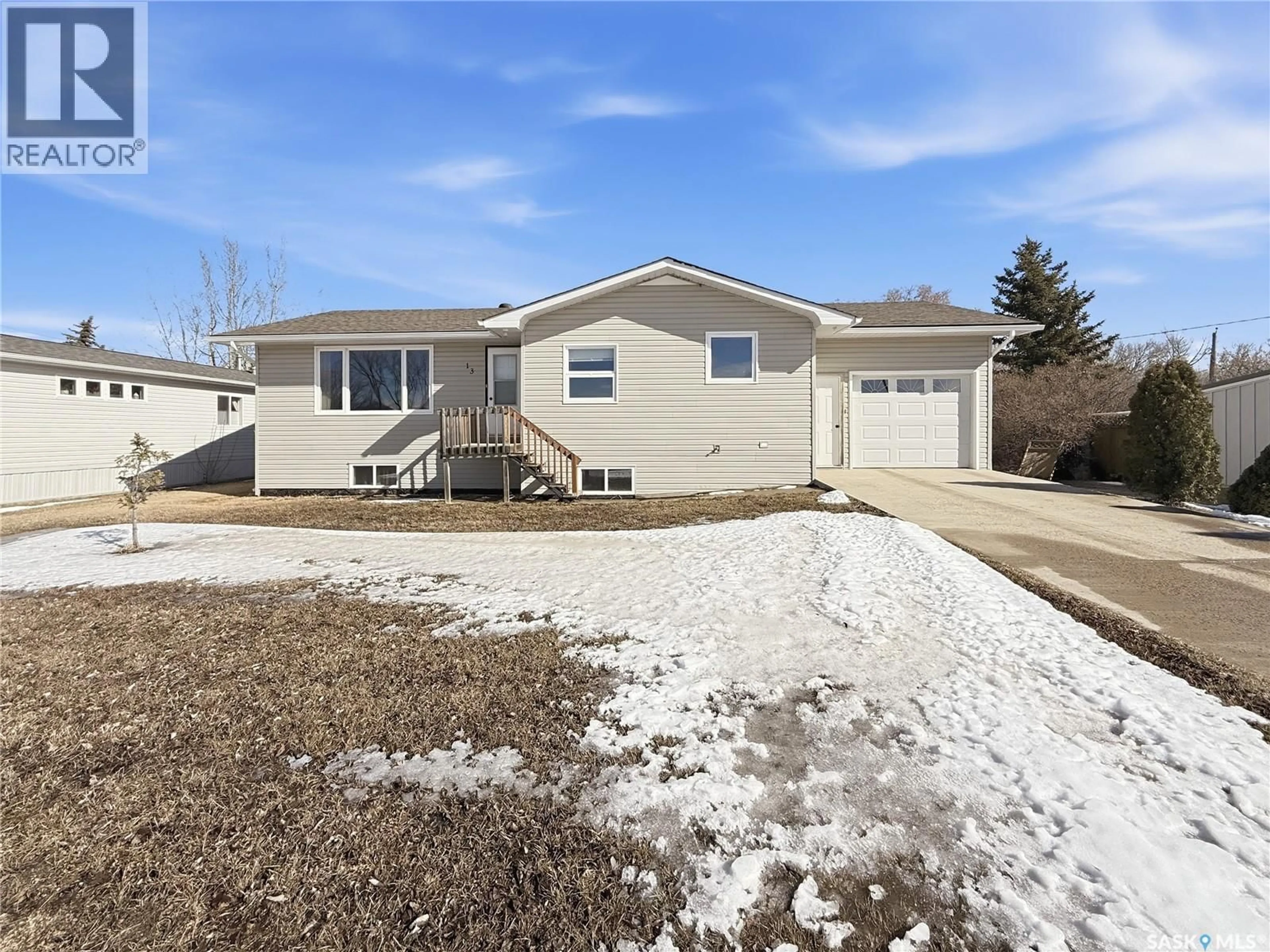 Home with vinyl exterior material, street for 13 SMITH STREET, Stewart Valley Saskatchewan S0N2P0