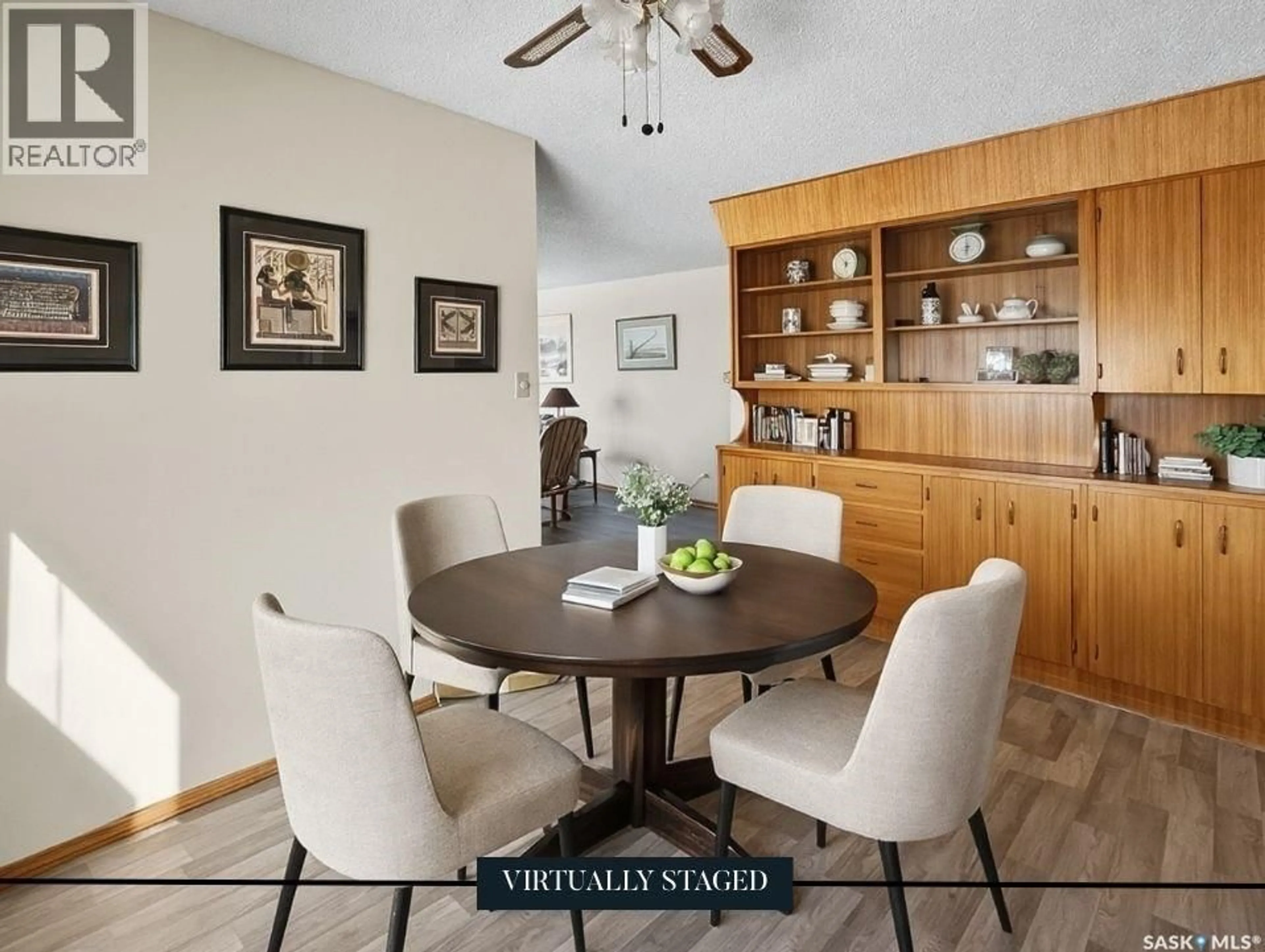Dining room, wood/laminate floor for 13 SMITH STREET, Stewart Valley Saskatchewan S0N2P0