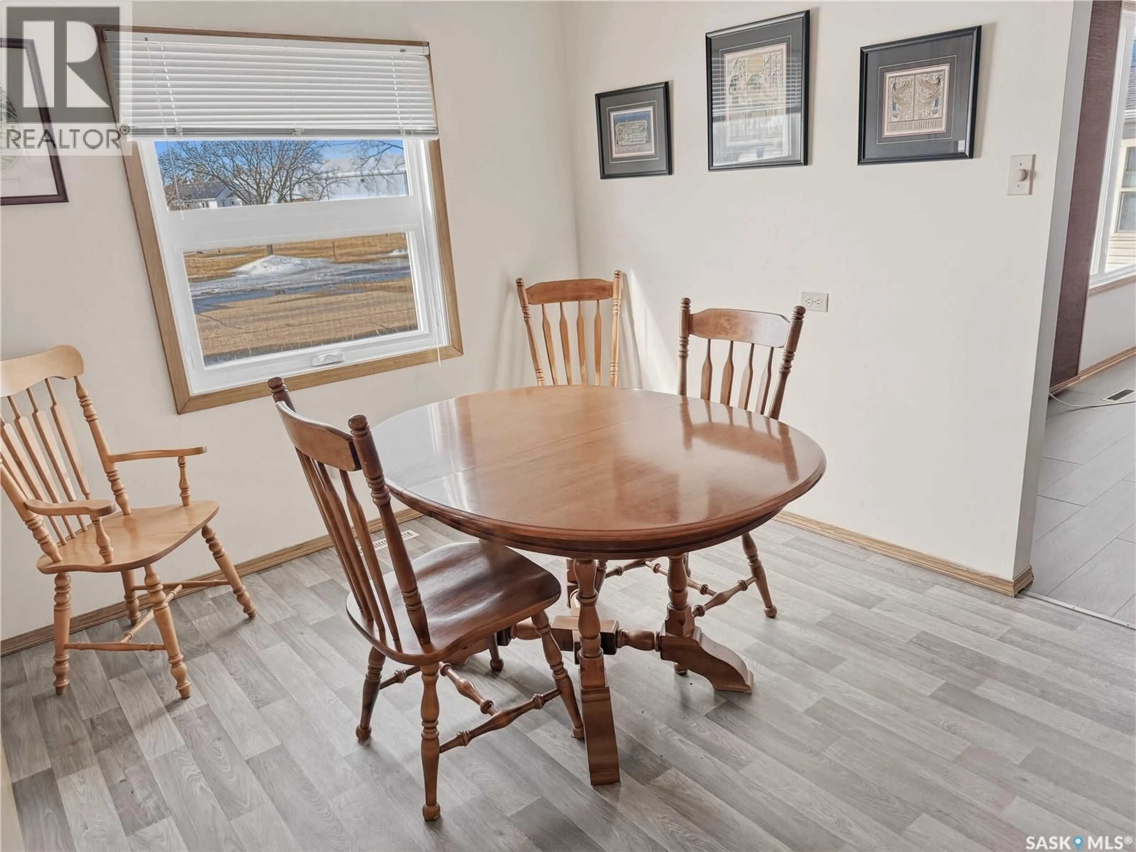 Dining room, wood/laminate floor for 13 SMITH STREET, Stewart Valley Saskatchewan S0N2P0