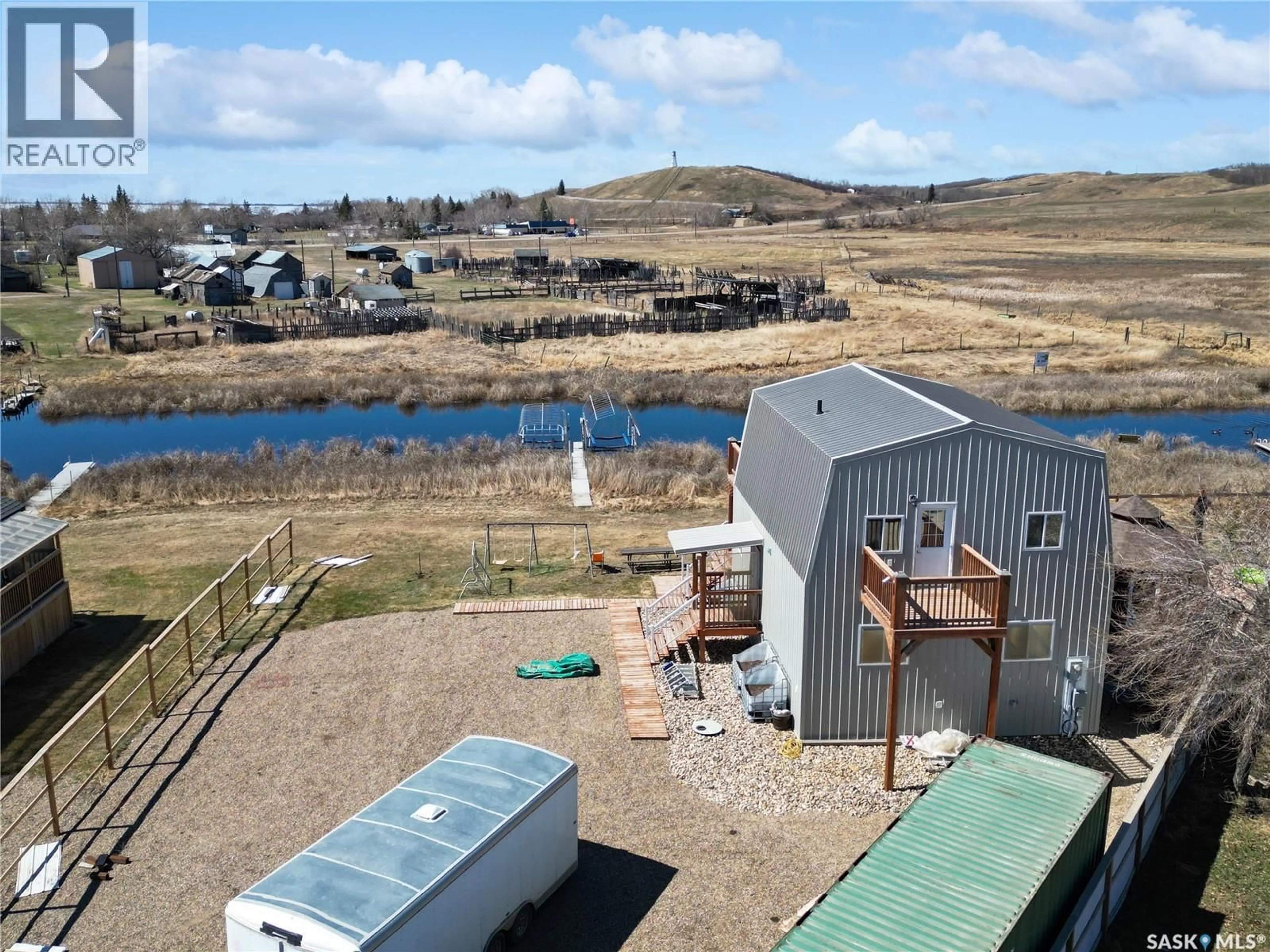 A pic from outside/outdoor area/front of a property/back of a property/a pic from drone, water/lake/river/ocean view for 130 MCLENNAN DRIVE, Cochin Saskatchewan S0M0L0