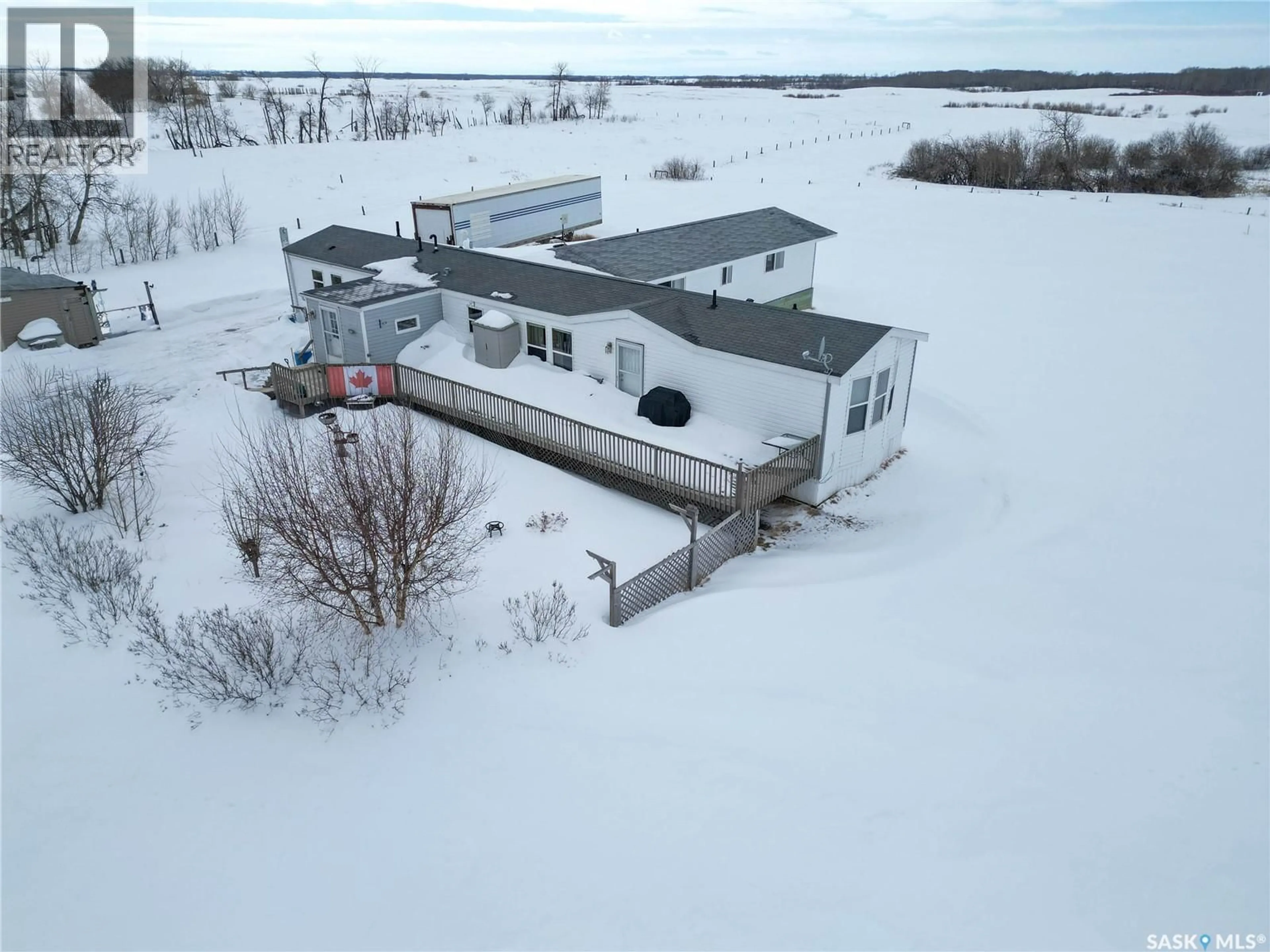 A pic from outside/outdoor area/front of a property/back of a property/a pic from drone, building for 302 EAST ACREAGE, Prince Albert Rm No. 461 Saskatchewan S6V8A6