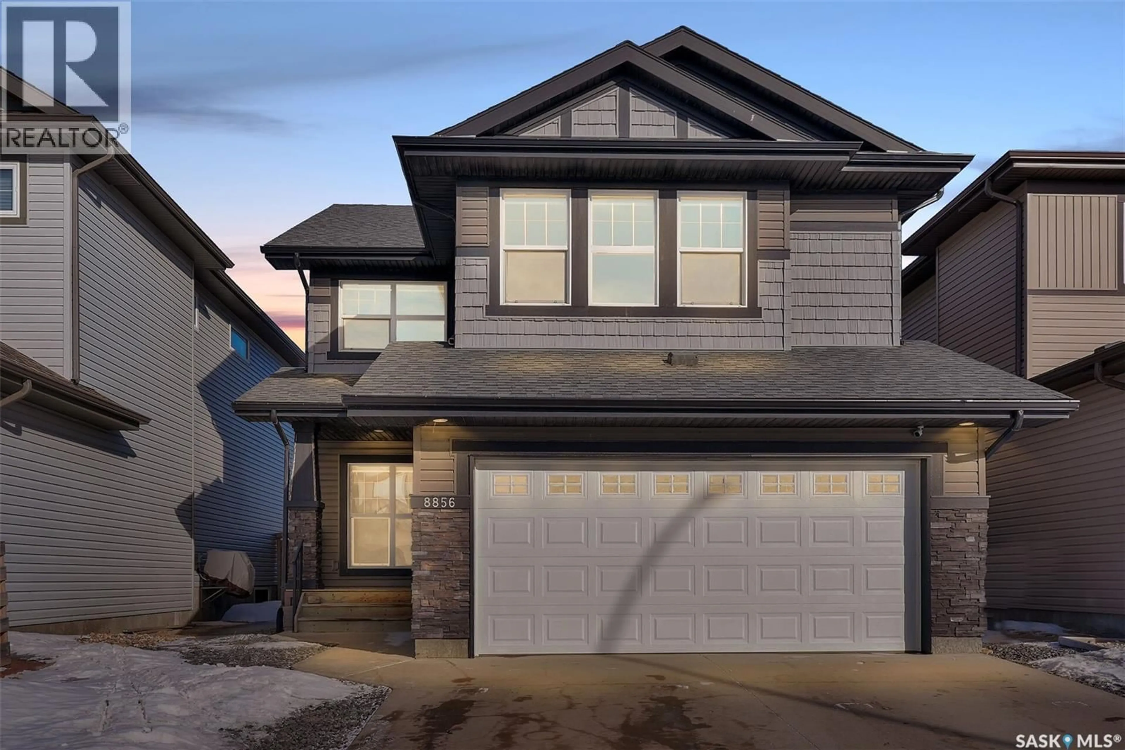 Home with vinyl exterior material, street for 8856 KESTRAL DRIVE, Regina Saskatchewan S4Y1H6
