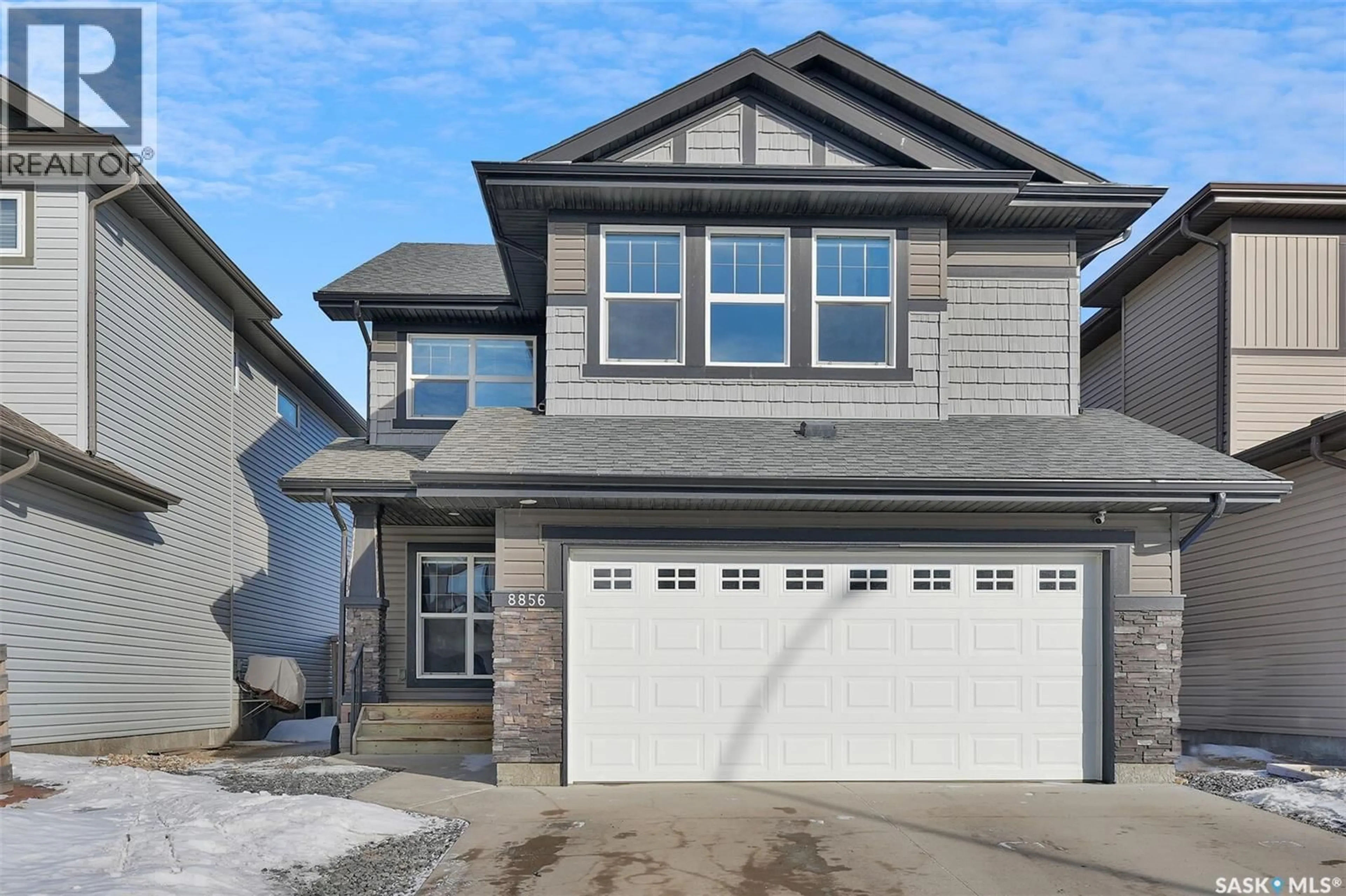 Home with vinyl exterior material, street for 8856 KESTRAL DRIVE, Regina Saskatchewan S4Y1H6