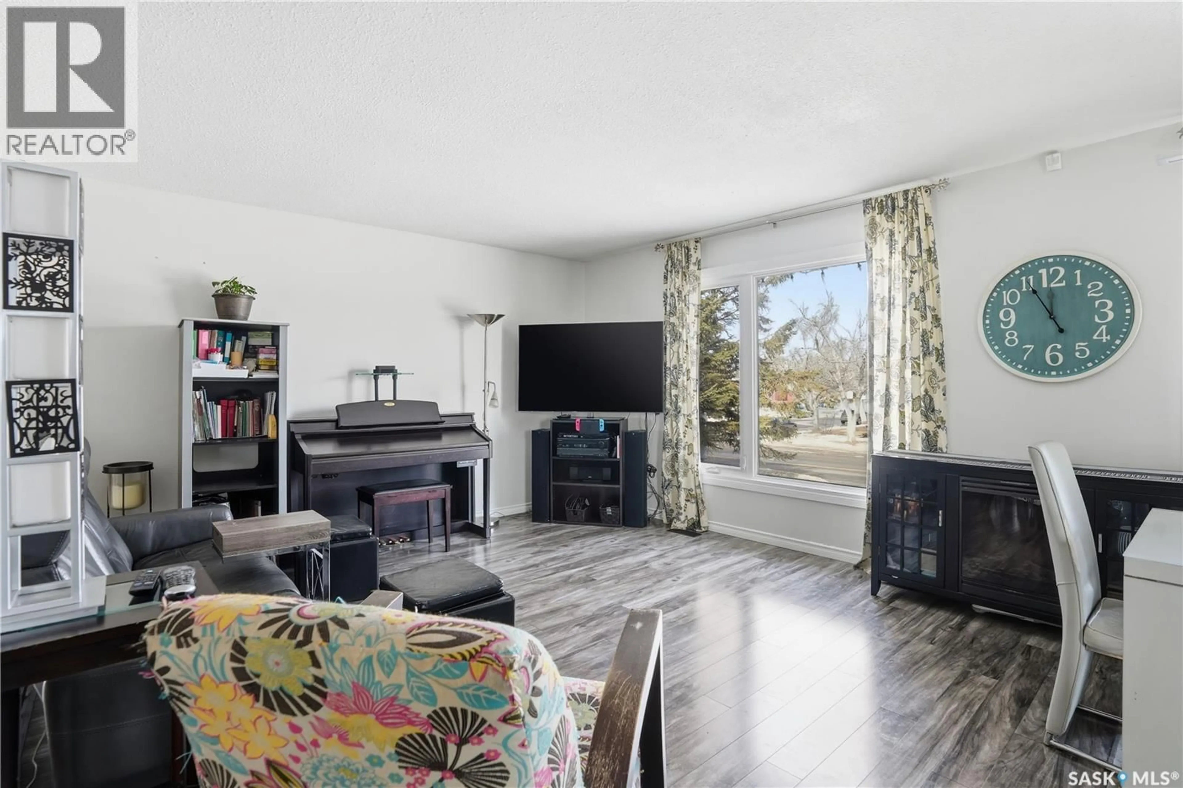 Living room with furniture, unknown for 6715 1ST AVENUE, Regina Saskatchewan S4X1C7