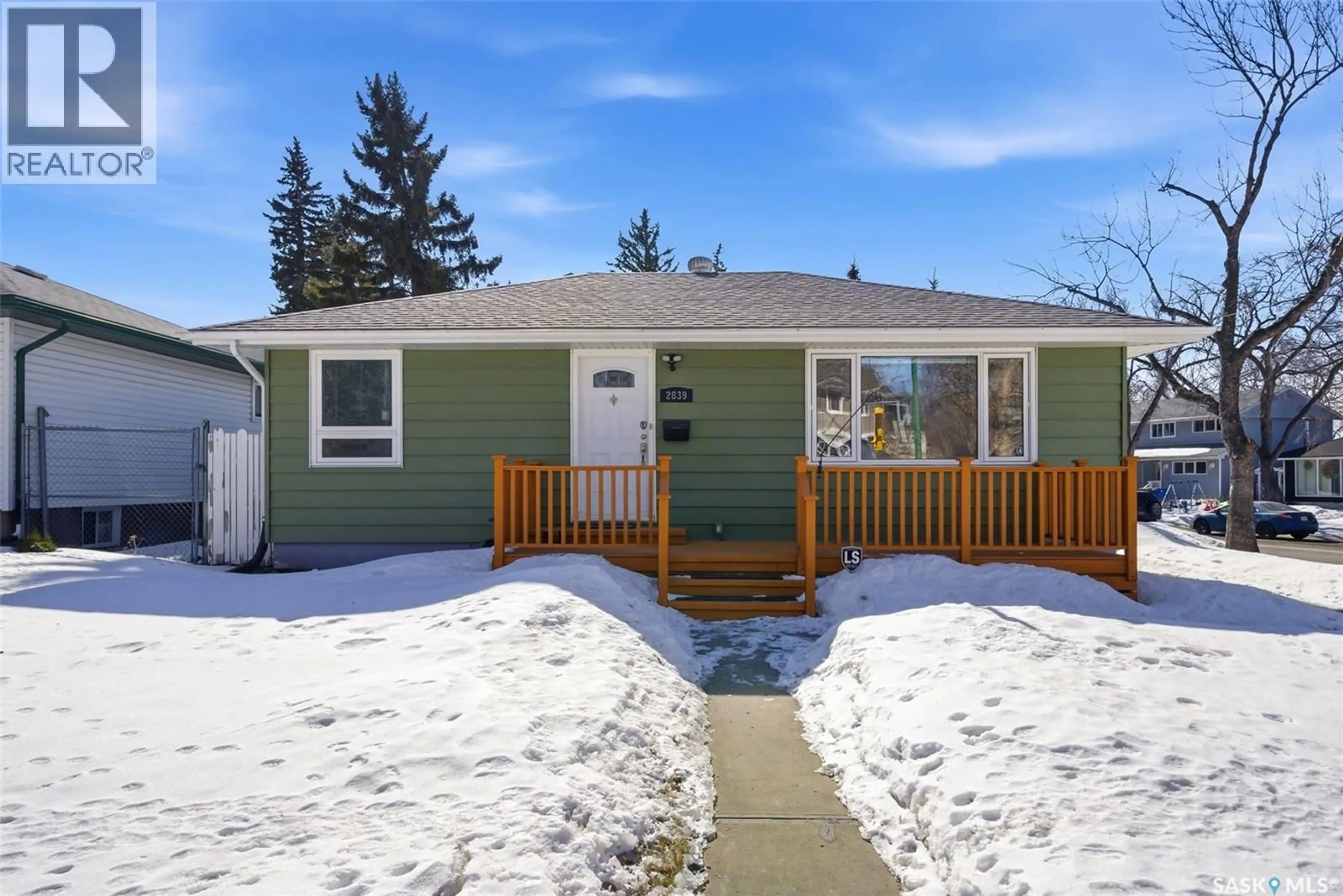 Home with vinyl exterior material, street for 2839 24TH AVENUE, Regina Saskatchewan S4S1J7