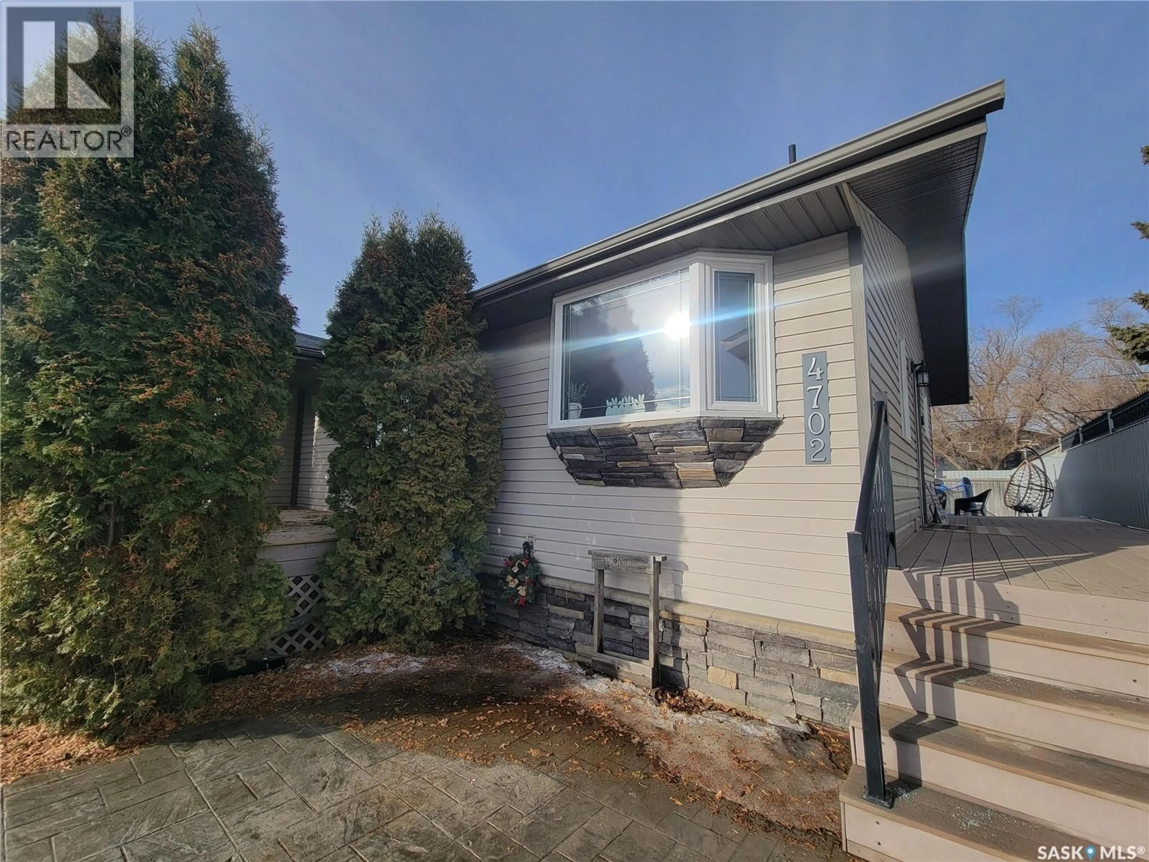 Home with vinyl exterior material, street for 4702 LEADER STREET, Macklin Saskatchewan S0L2C0