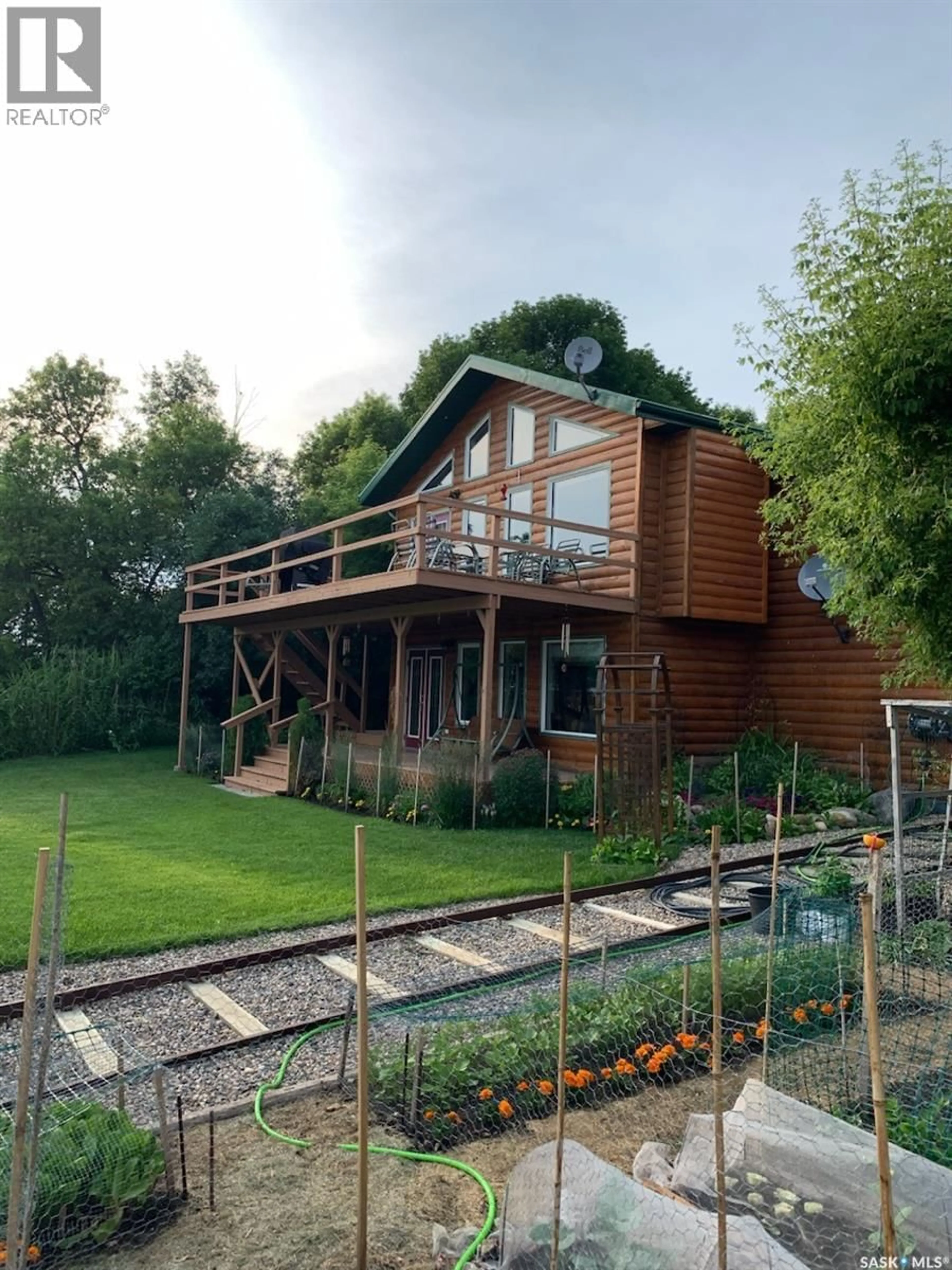 A pic from outside/outdoor area/front of a property/back of a property/a pic from drone, building for 104 ELK ROAD, Crooked Lake Saskatchewan S0G2B0