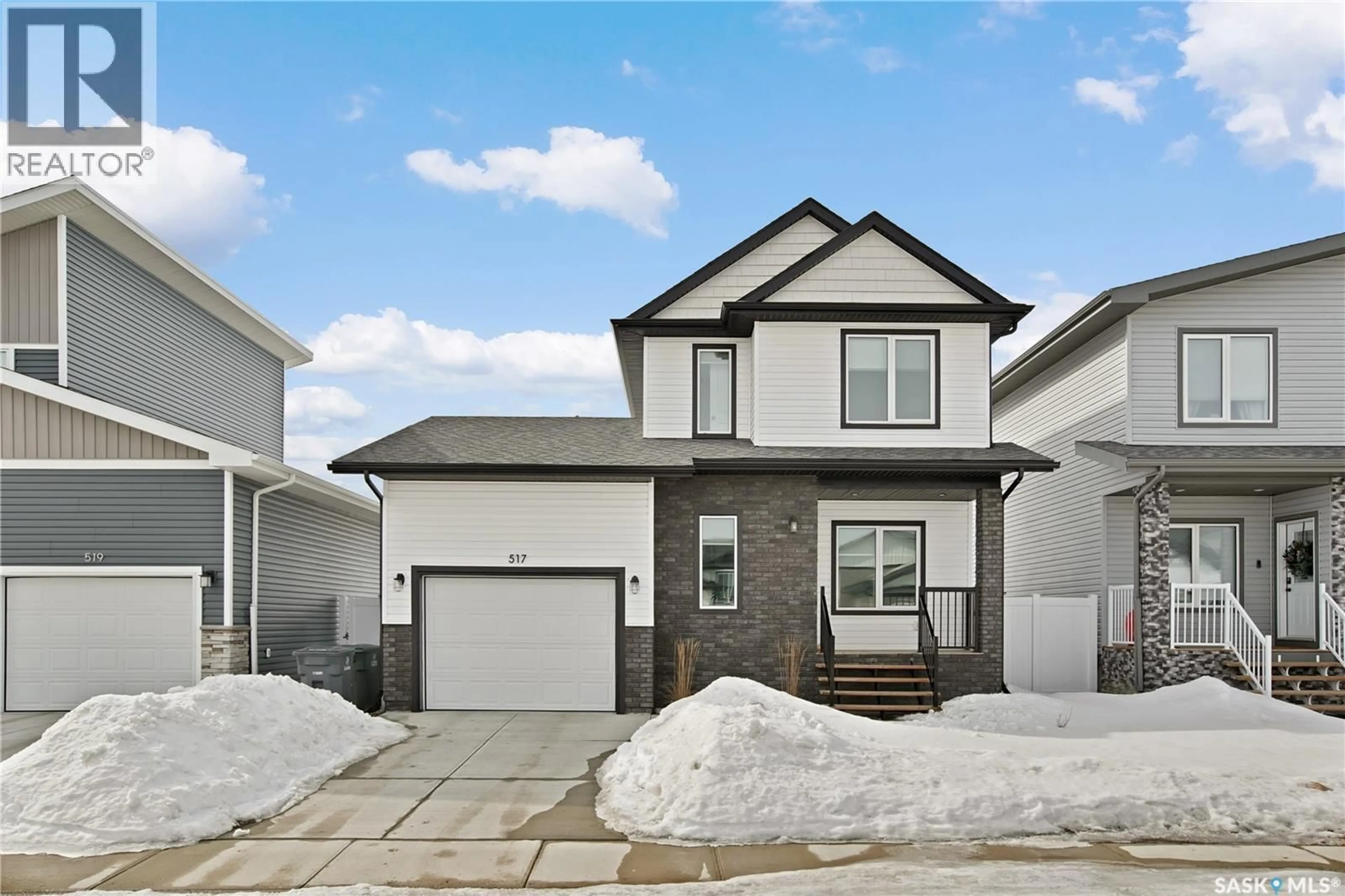 Home with vinyl exterior material, street for 517 FROESE STREET, Warman Saskatchewan S0K4S3