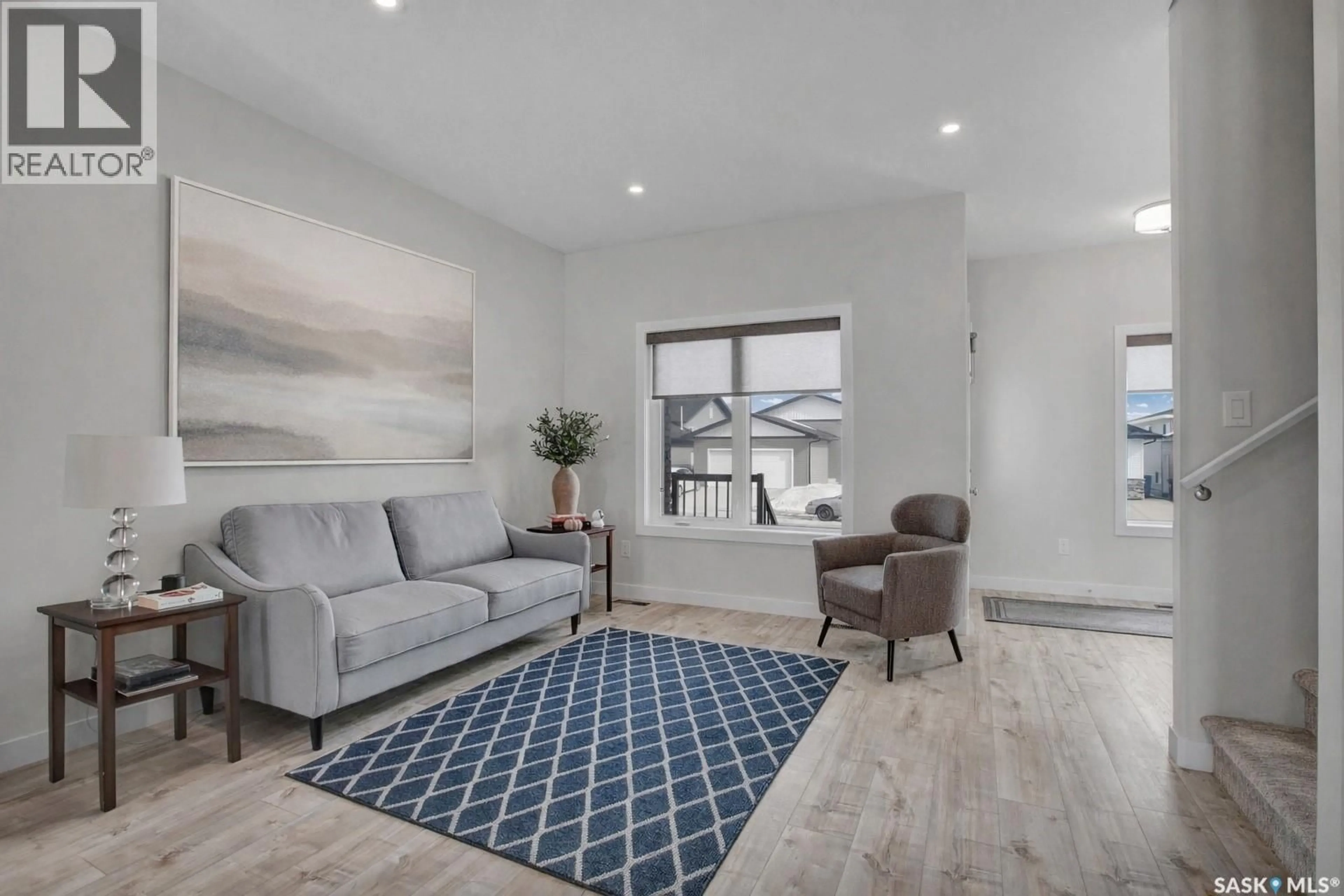 Living room with furniture, unknown for 517 FROESE STREET, Warman Saskatchewan S0K4S3