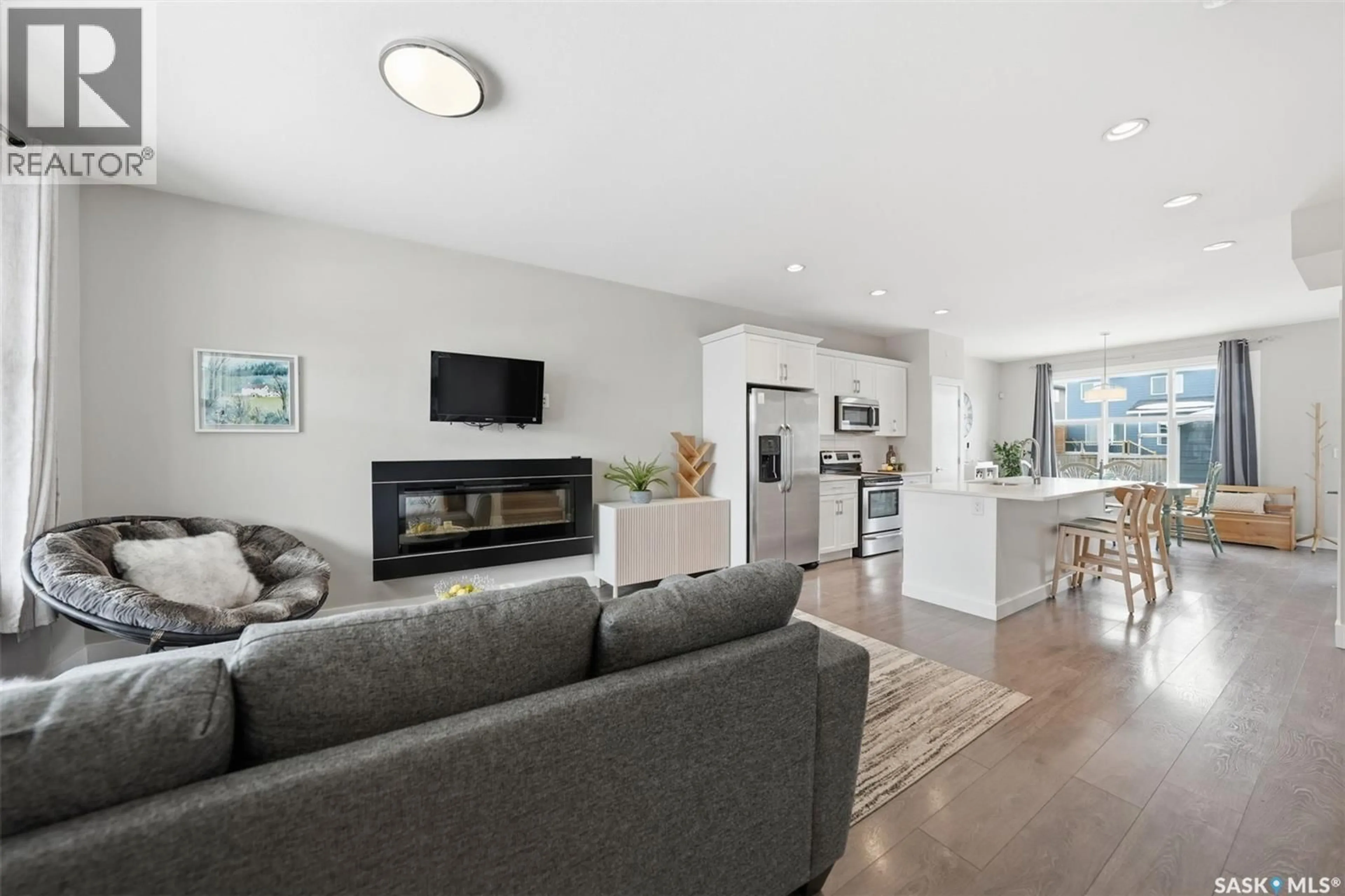 Living room with furniture, unknown for 668 MEADOWS BOULEVARD, Saskatoon Saskatchewan S7V0M5