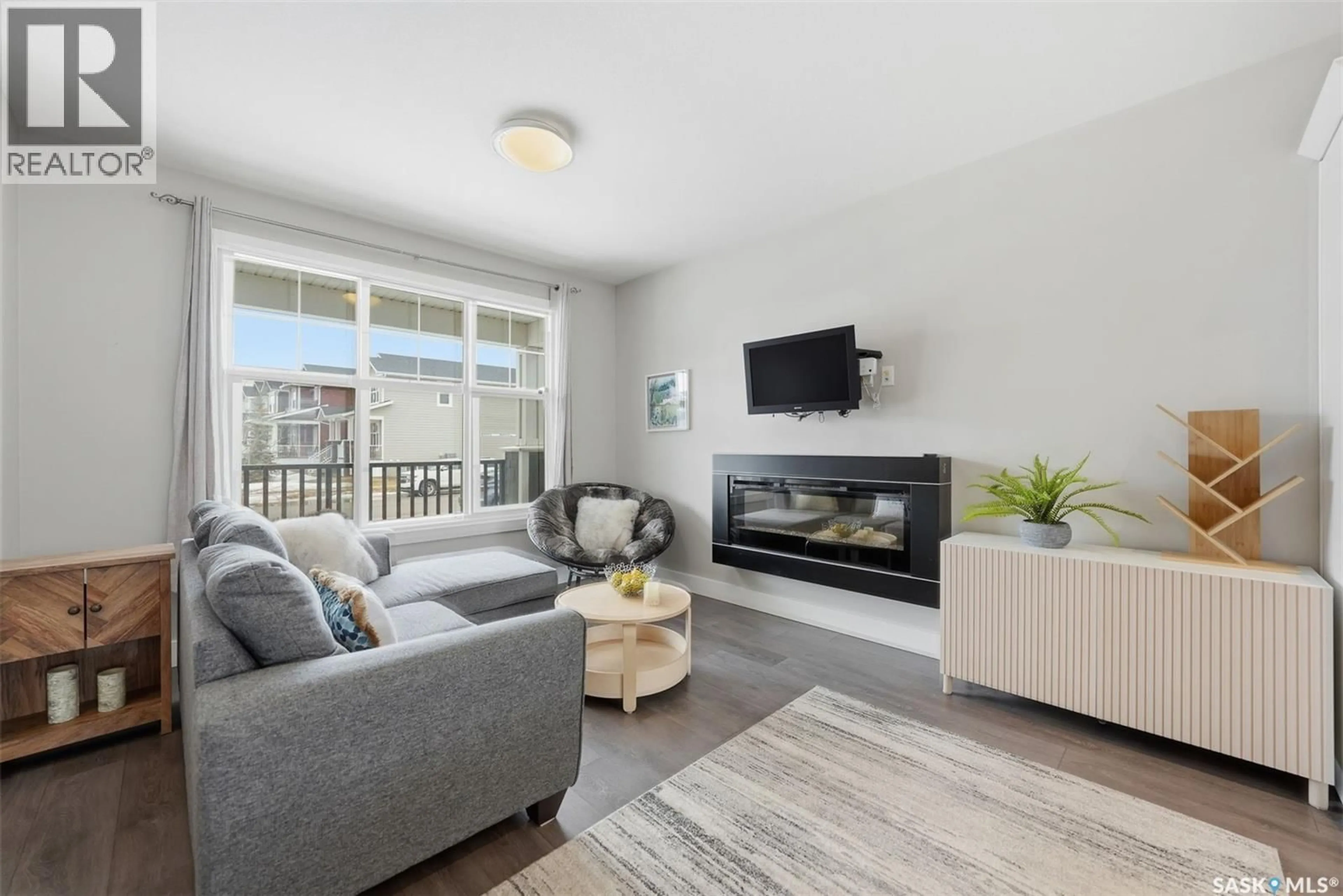 Living room with furniture, unknown for 668 MEADOWS BOULEVARD, Saskatoon Saskatchewan S7V0M5