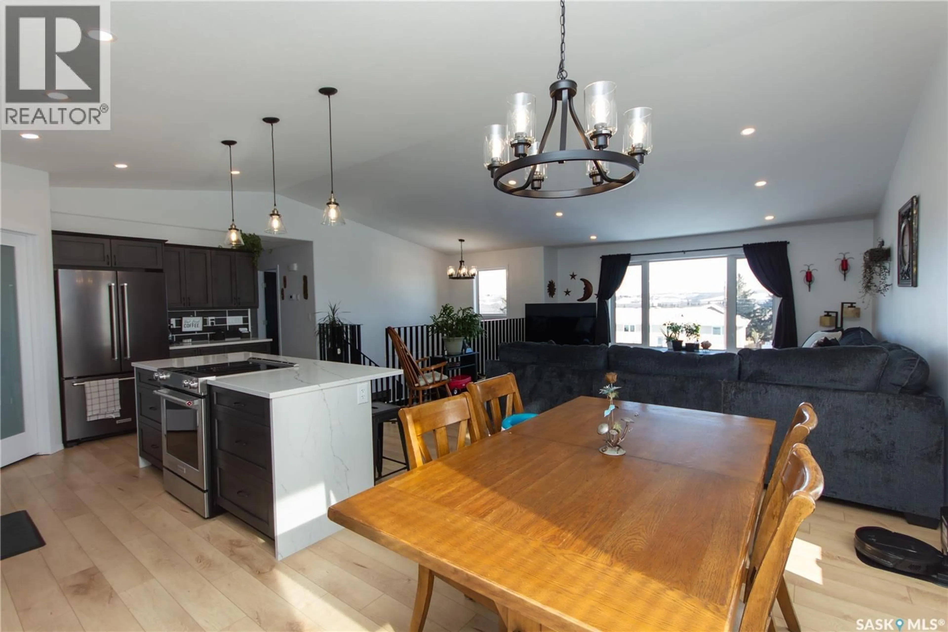 Open concept kitchen, wood/laminate floor for 21 1ST AVENUE, Battleford Saskatchewan S0M0E0